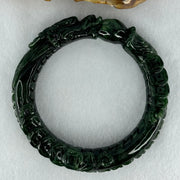 Type A Translucent to Opaque Old Mine Spicy Green Jadeite Dragon Bangle Internal Diameter 56.30mm 374.20cts 74.75g 16.0 by 12.5mm With NGI Cert 32885979 (Slight Internal Lines) - Huangs Jadeite and Jewelry Pte Ltd
