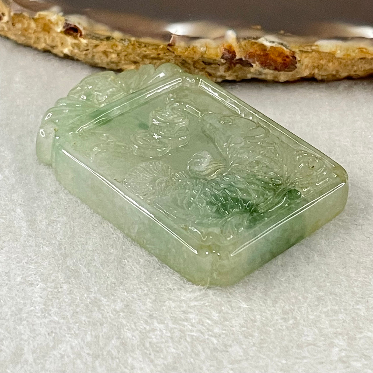 (Pre-Love) Lotus on Water by Yun Long Zi Type A Semi Icy Light Green with Green Piao Hua Jadeite Arona Fish with Bat and Coins 30.46g 48.9 by 31.6 by 7.9mm with Full Original Box Set - Huangs Jadeite and Jewelry Pte Ltd