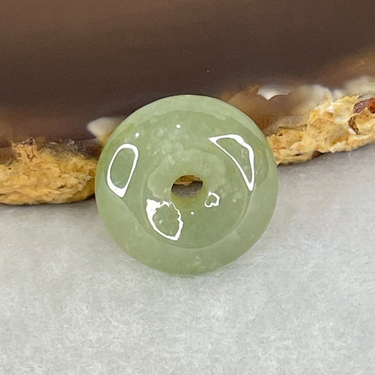 Type A Semi Icy Green Jadeite Ping An Kou Donut Charm Pendant 3.53g 16.8 by 6.4mm - Huangs Jadeite and Jewelry Pte Ltd