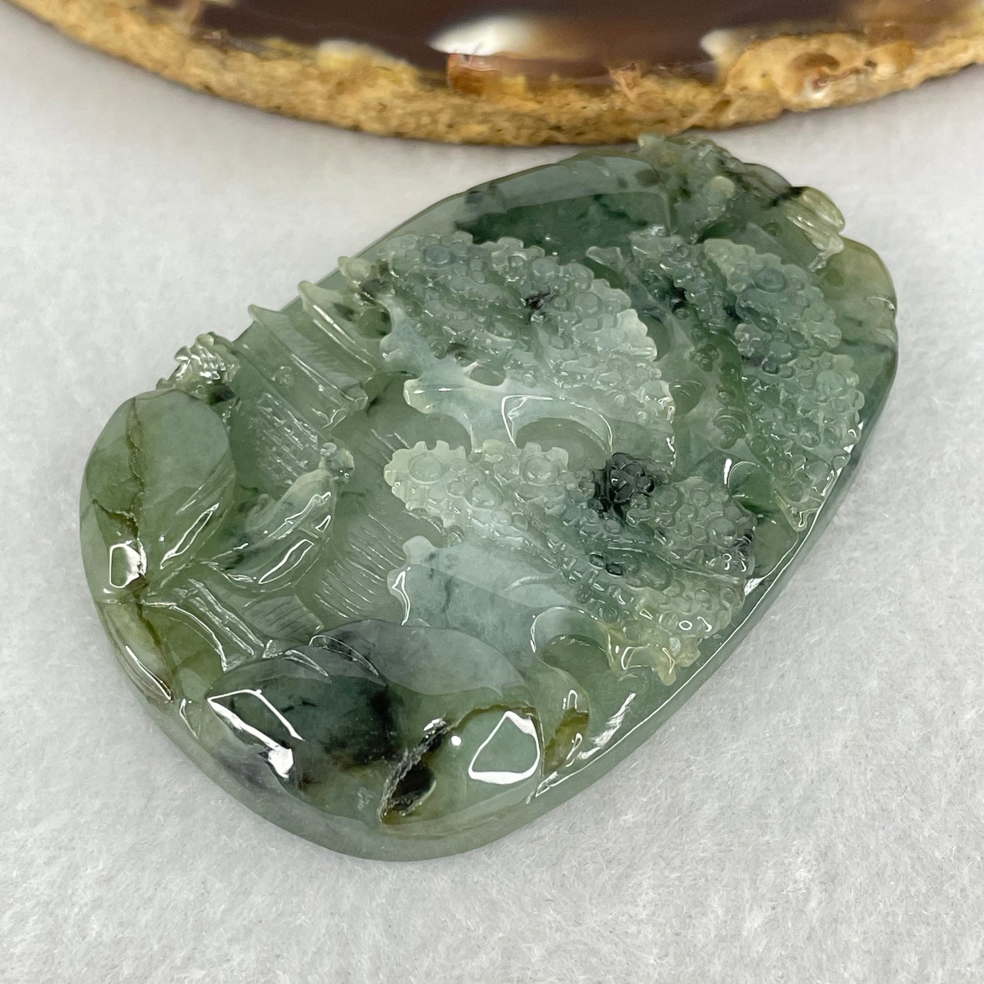 Type A Semi Icy Green with Dark Green Piao Hua Jadeite Shan Shui Gui Ren Benefactor Pendant 53.05g 59.6 by 40.3 by 10.7mm - Huangs Jadeite and Jewelry Pte Ltd