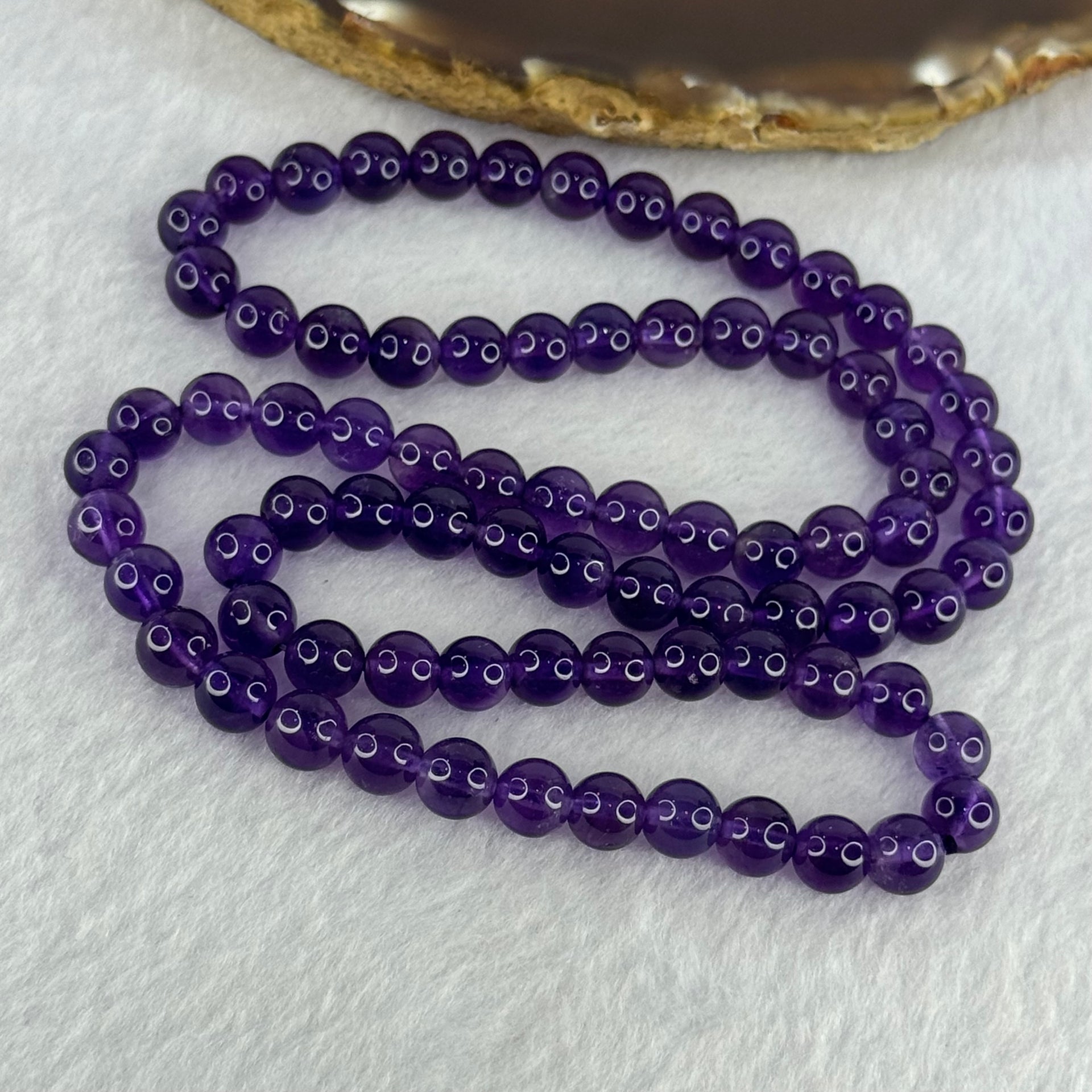 Good Grade Natural Amethyst Necklace 39.39g 52cm 7.2mm 79 Beads - Huangs Jadeite and Jewelry Pte Ltd