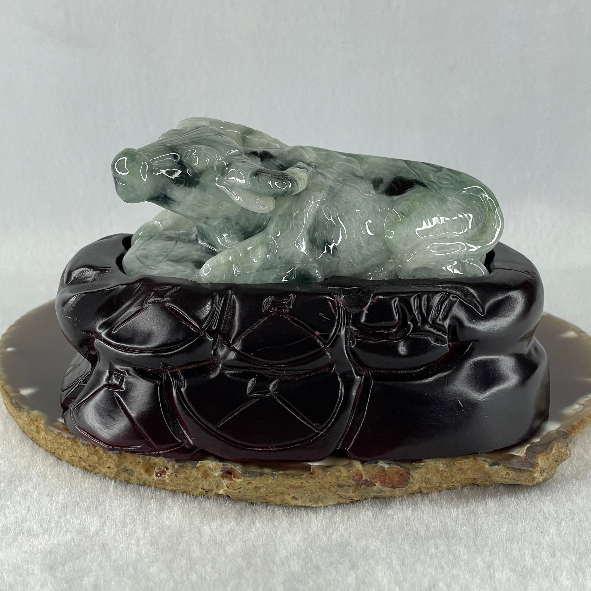 Natural Type A Light Green Light Lavender with Dark Green Patches Jadeite Ox with Wooden Stand Display 341.7g 116.5 by 73.9 by 66.0mm - Huangs Jadeite and Jewelry Pte Ltd