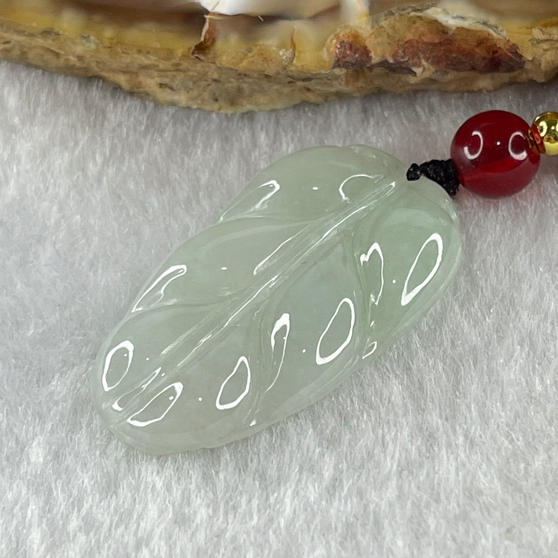 Natural Type A Faint Green Jadeite Leaf Pendant 4.77g 24.8 by 16.4 by 4.0mm - Huangs Jadeite and Jewelry Pte Ltd