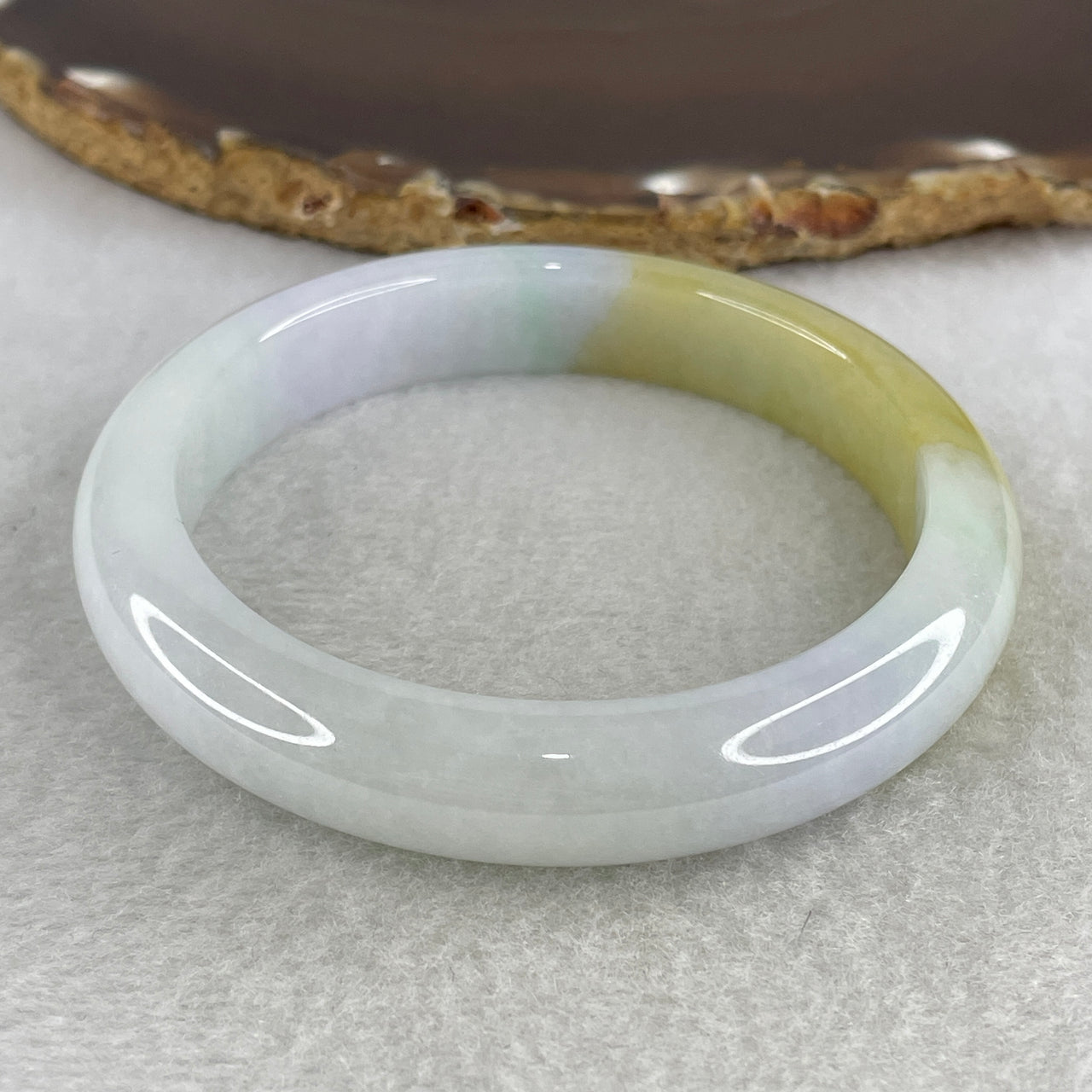 Natural Type A Multicolor Jadeite Bangle | 57.1mm Faint Green & Light Lavender with Earthy Brown Patch | Close to Perfect Translucent "San Cai" Round Wrist Heirloom (52.96g 11.7x8.5mm)