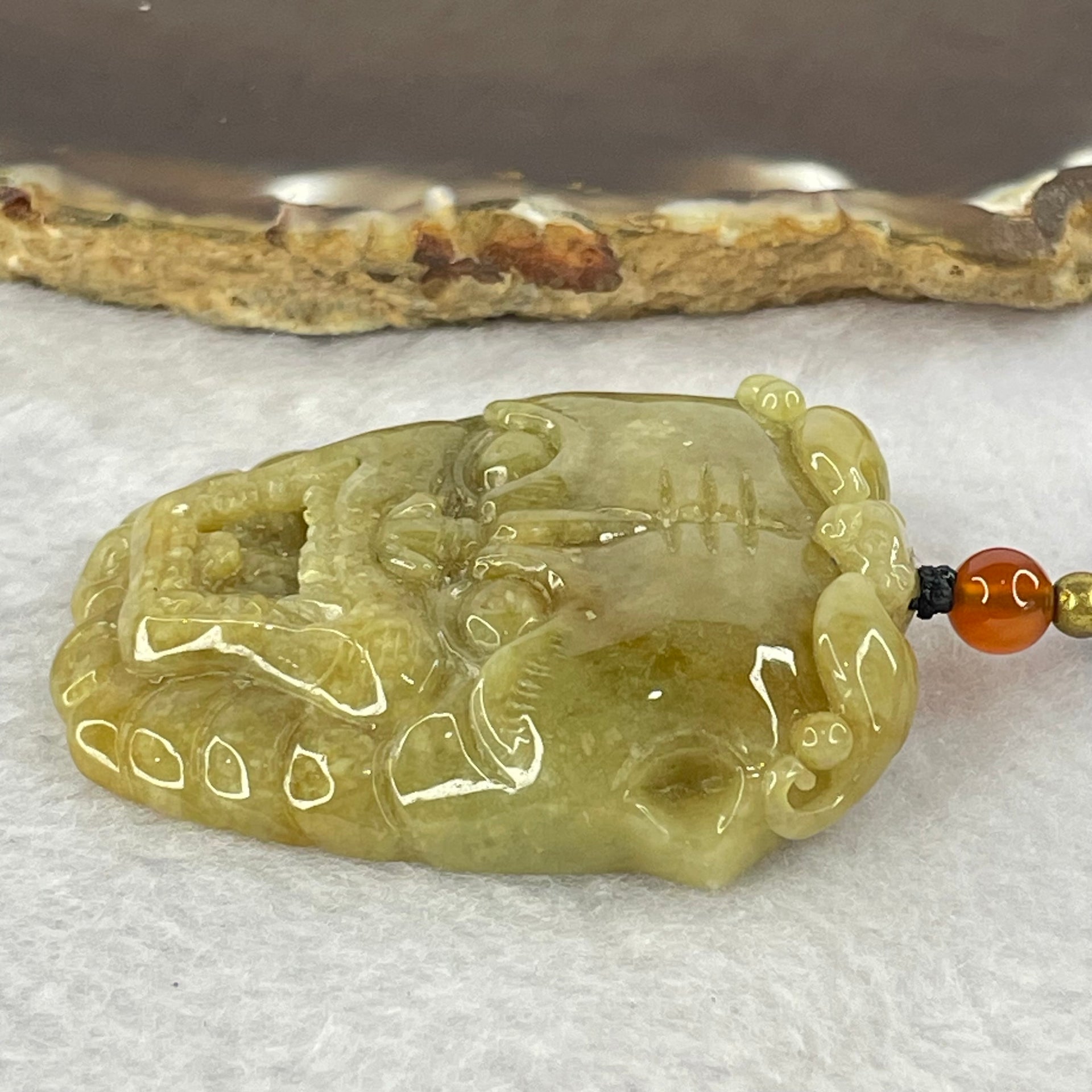 Type A Yellowish Brown Jadeite Tiger Head Pendent 48.59g 49.3 by 42.1 by 12.0mm - Huangs Jadeite and Jewelry Pte Ltd