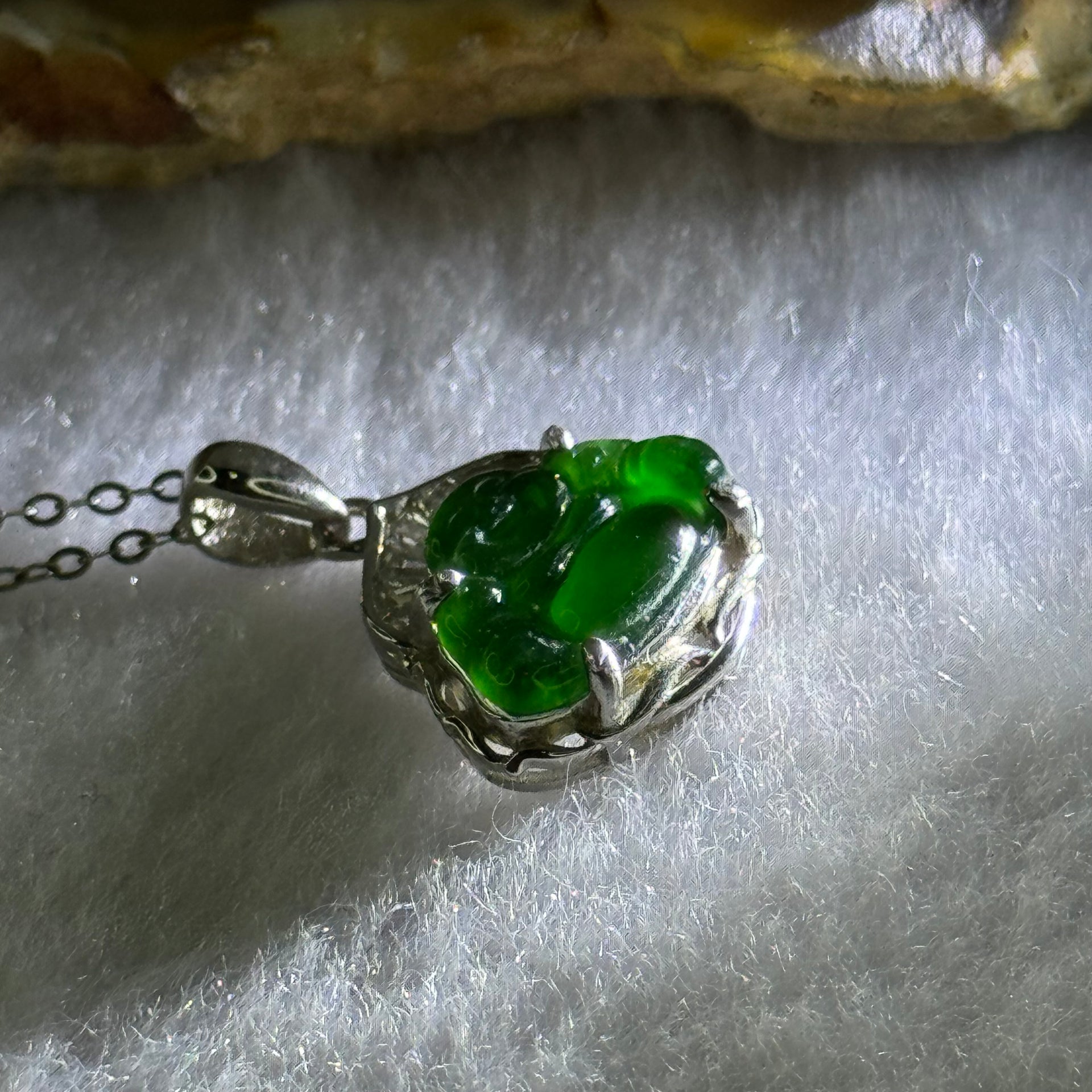 Type A Icy Green Omphasite Jadeite Milo Buddha 9.3 by 13.1 by 2.0mm in S925 Sliver Necklace 2.18g - Huangs Jadeite and Jewelry Pte Ltd