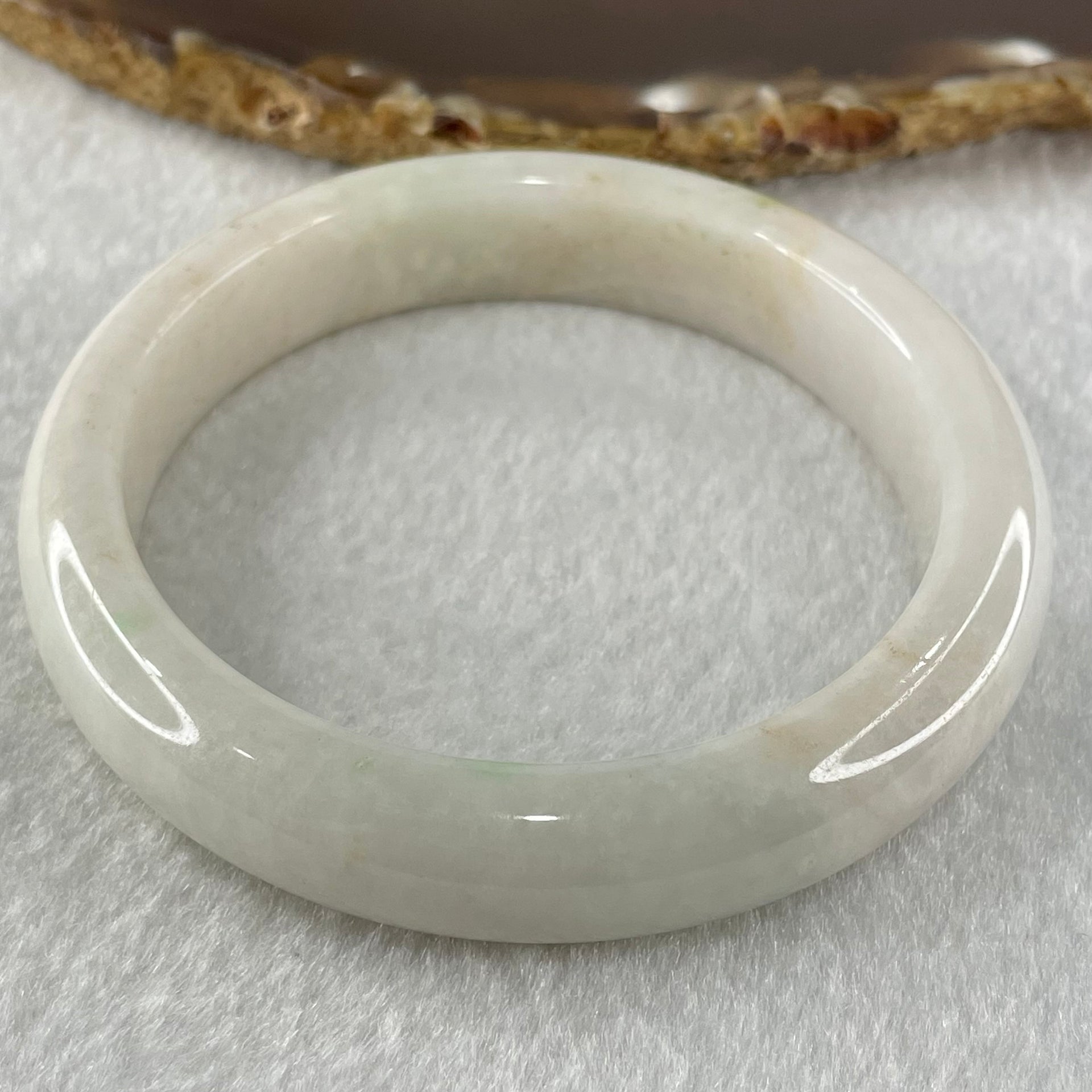 Type A Faint Lavender Green to White Jadeite Bangle 61.55g Internal Diameter 58.3mm 13.0 by 8.5mm (Slight External Roughs and Internal Lines) - Huangs Jadeite and Jewelry Pte Ltd