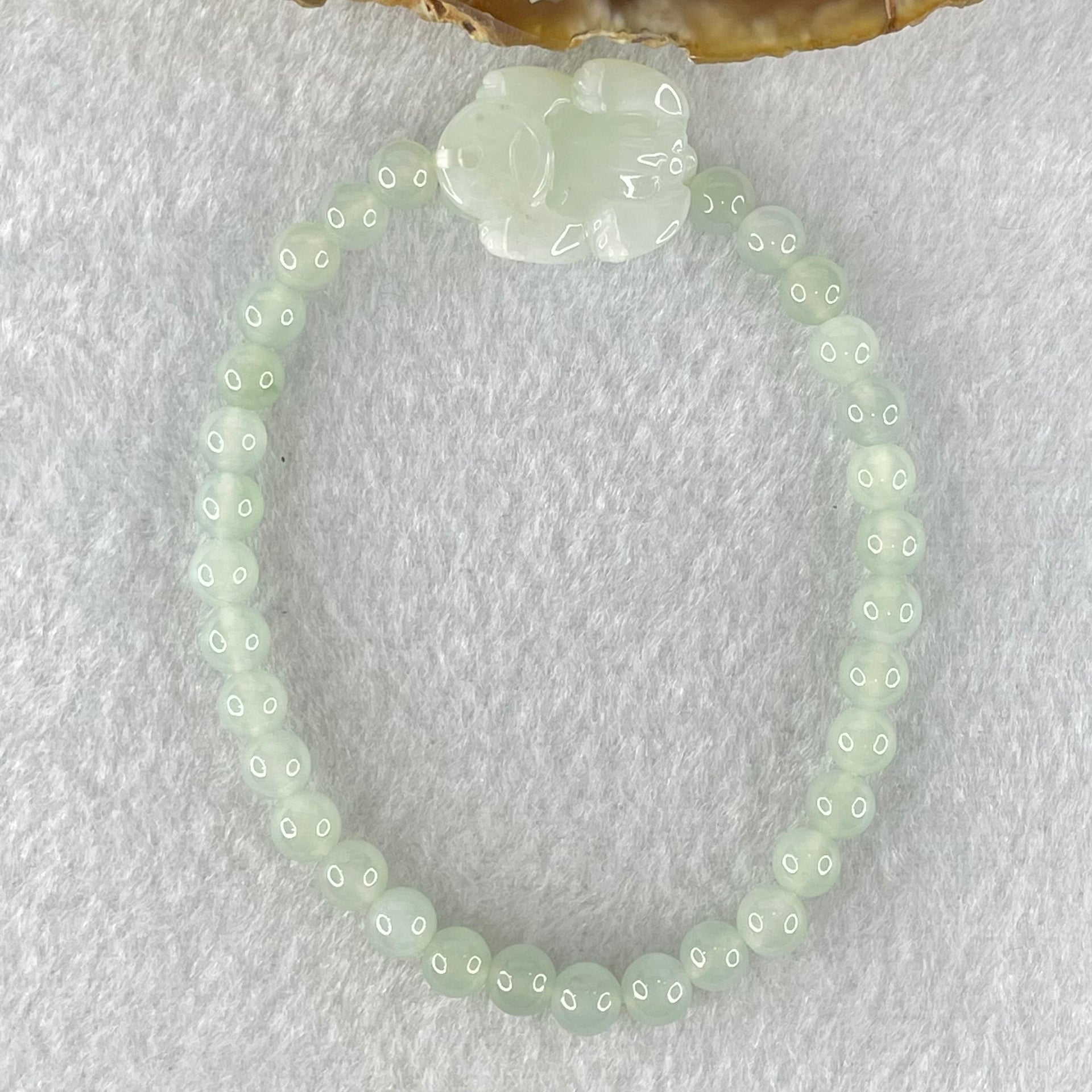 Type A Light Blueish Green Jadeite Beads with Faint Lavender Green Male Pixiu Charm Bracelet 13.83g 16.5cm 5.4mm 32 Beads 20.0 by 15.6 by 10.0mm - Huangs Jadeite and Jewelry Pte Ltd