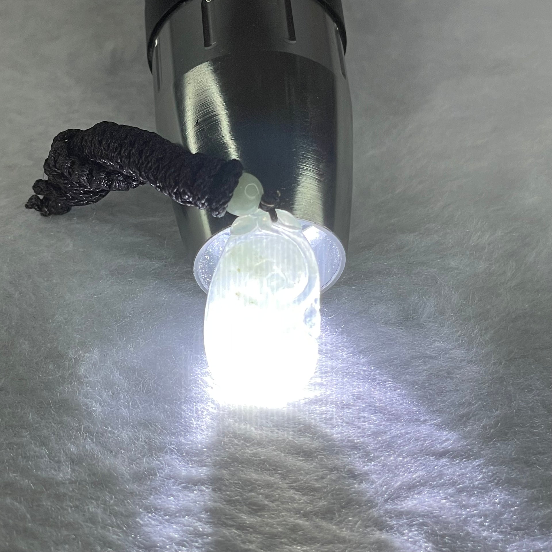 Type A Jelly Light Green Jadeite Ruyi 3.31g 24.4 by 14.4 by 3.5mm - Huangs Jadeite and Jewelry Pte Ltd