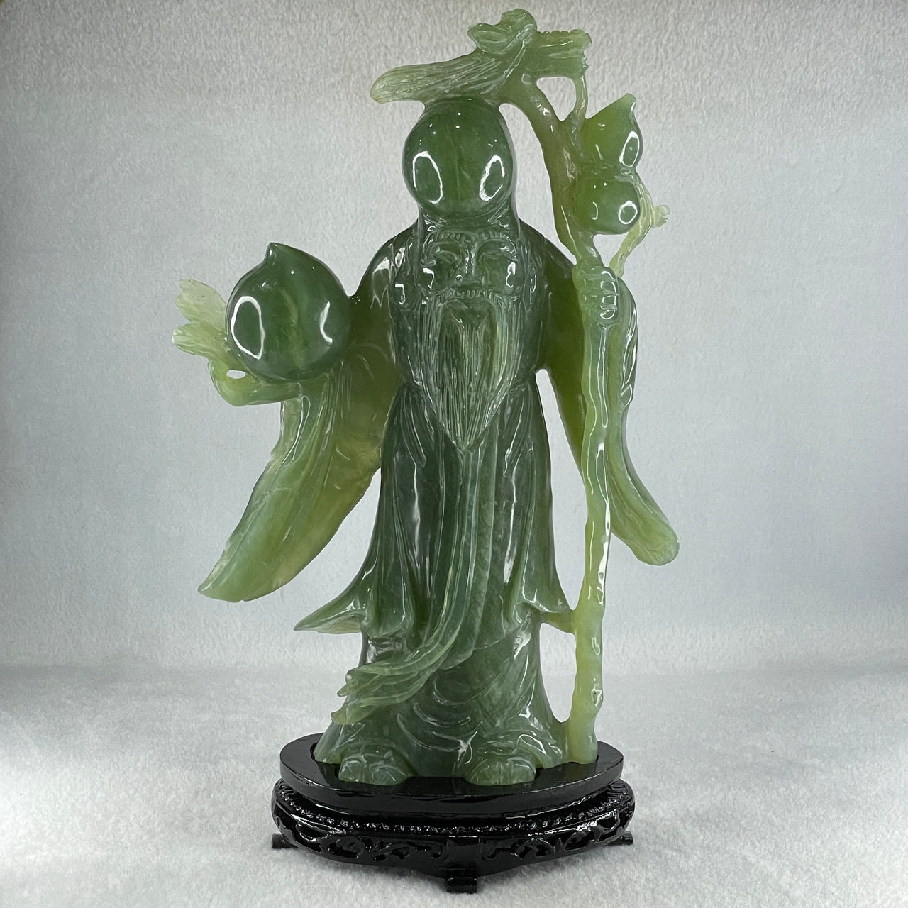 Natural Dark Green Serpentine Shou Xing Gong with Longevity Peach with Wooden Stand Display 1,383.8g 167.0 by 265.0 by 62.0mm - Huangs Jadeite and Jewelry Pte Ltd