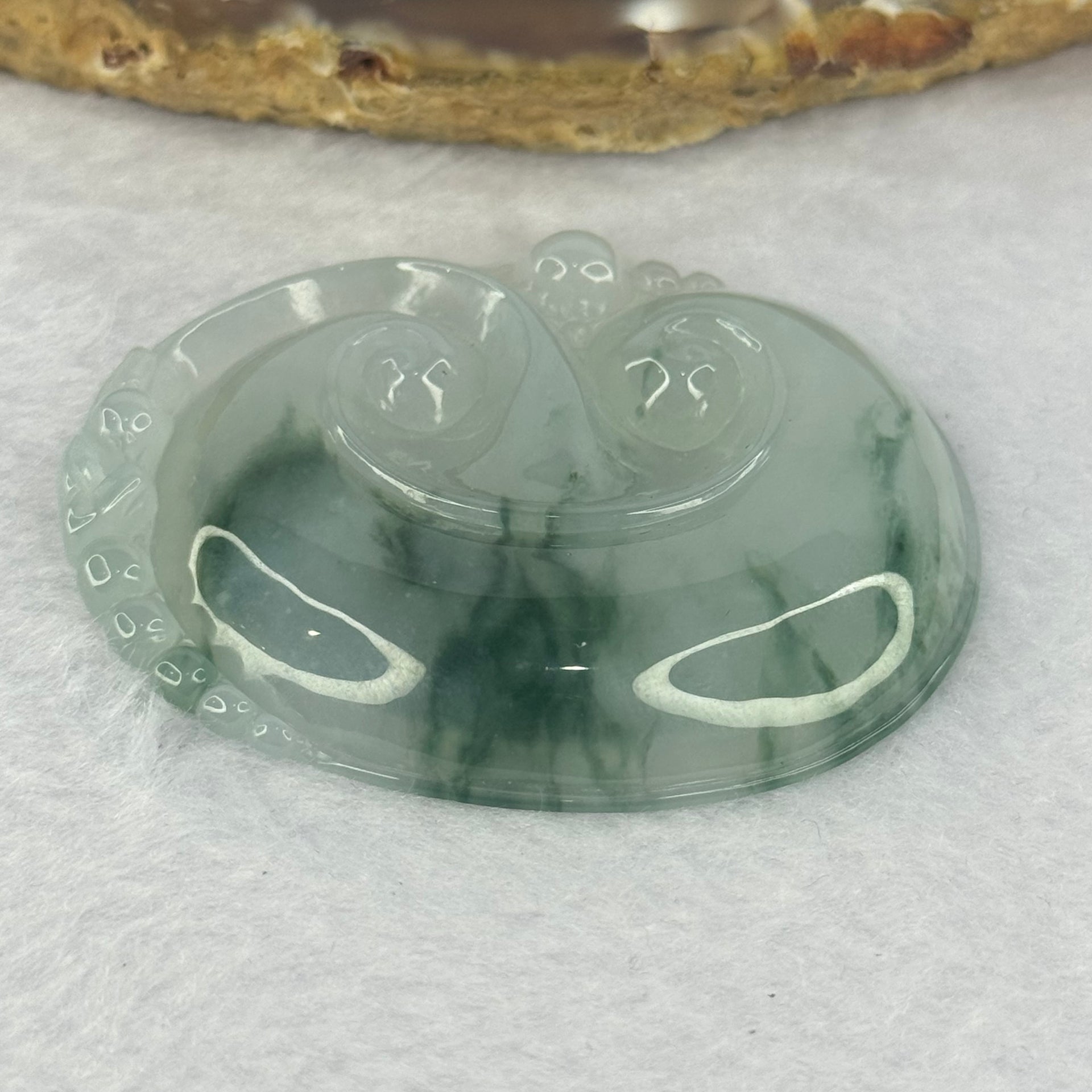 Grandmaster Certified Type A Icy Light Green with Blueish Green Piao Hua Ruyi Pendent 28.04g 53.2 by 42.7 by 7.1mm - Huangs Jadeite and Jewelry Pte Ltd