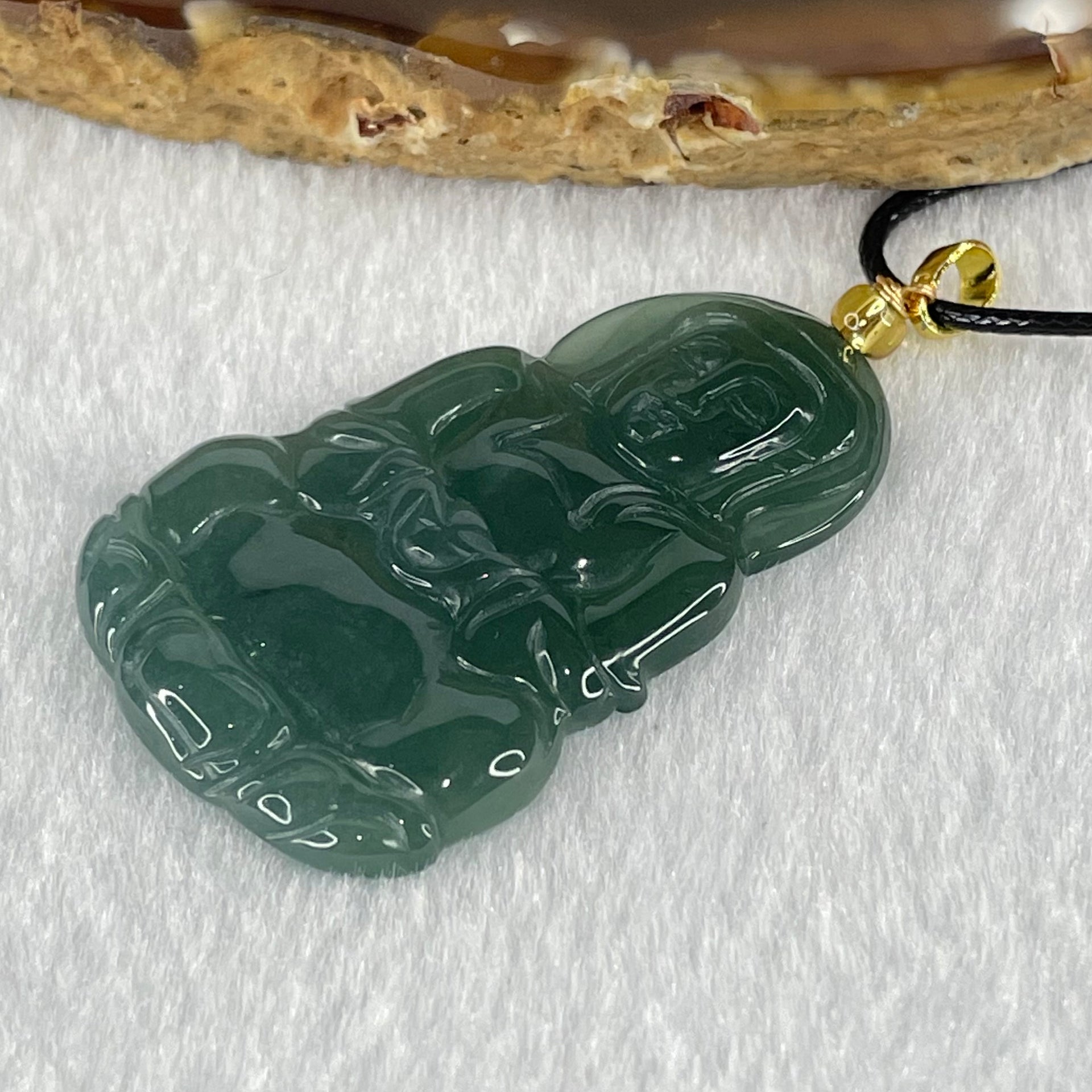 Type A Icy Blueish Green Jadeite Guan Yin Pendant Necklace 7.22g 40.9 by 26.8 by 4.0mm - Huangs Jadeite and Jewelry Pte Ltd