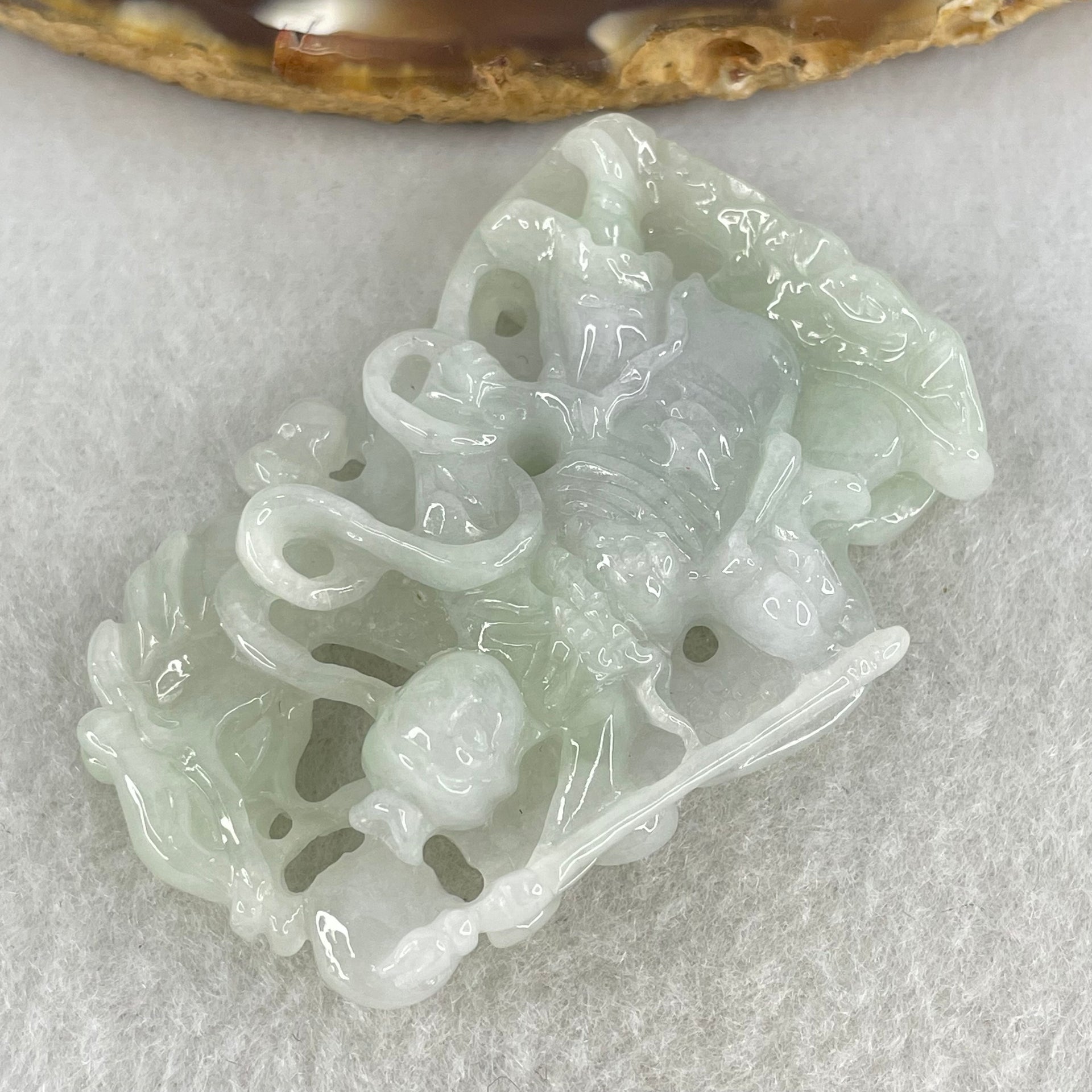 Type A Light Green with Lavender Jadeite Sun Wu Kong with Dragon Pendant 26.42g 52.8 by 36.3 by 36.2mm - Huangs Jadeite and Jewelry Pte Ltd