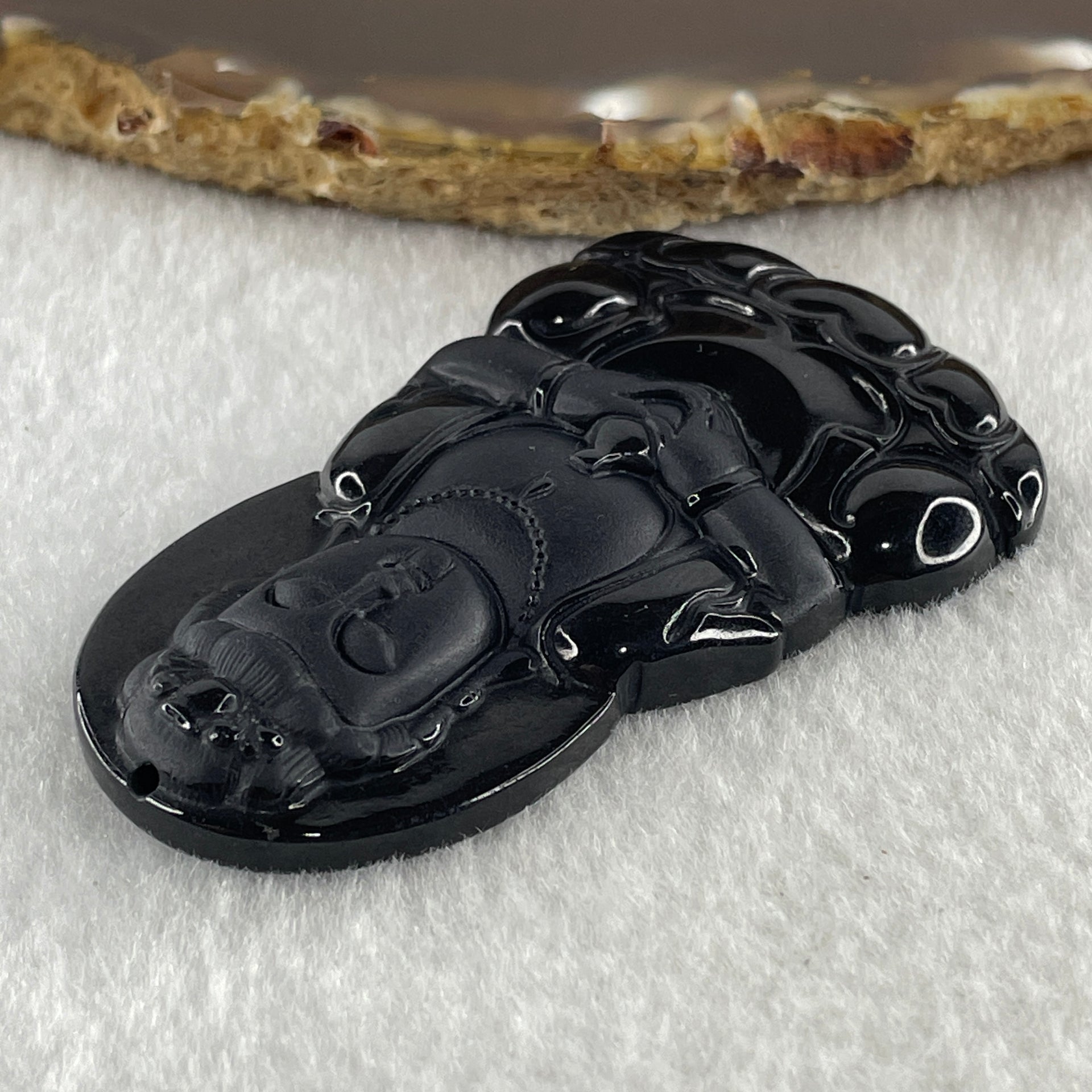 Type A Opaque Black Omphacite Jadeite Guan Yin Pendant 28.39g 63.4 by 38.8 by 7.5mm - Huangs Jadeite and Jewelry Pte Ltd