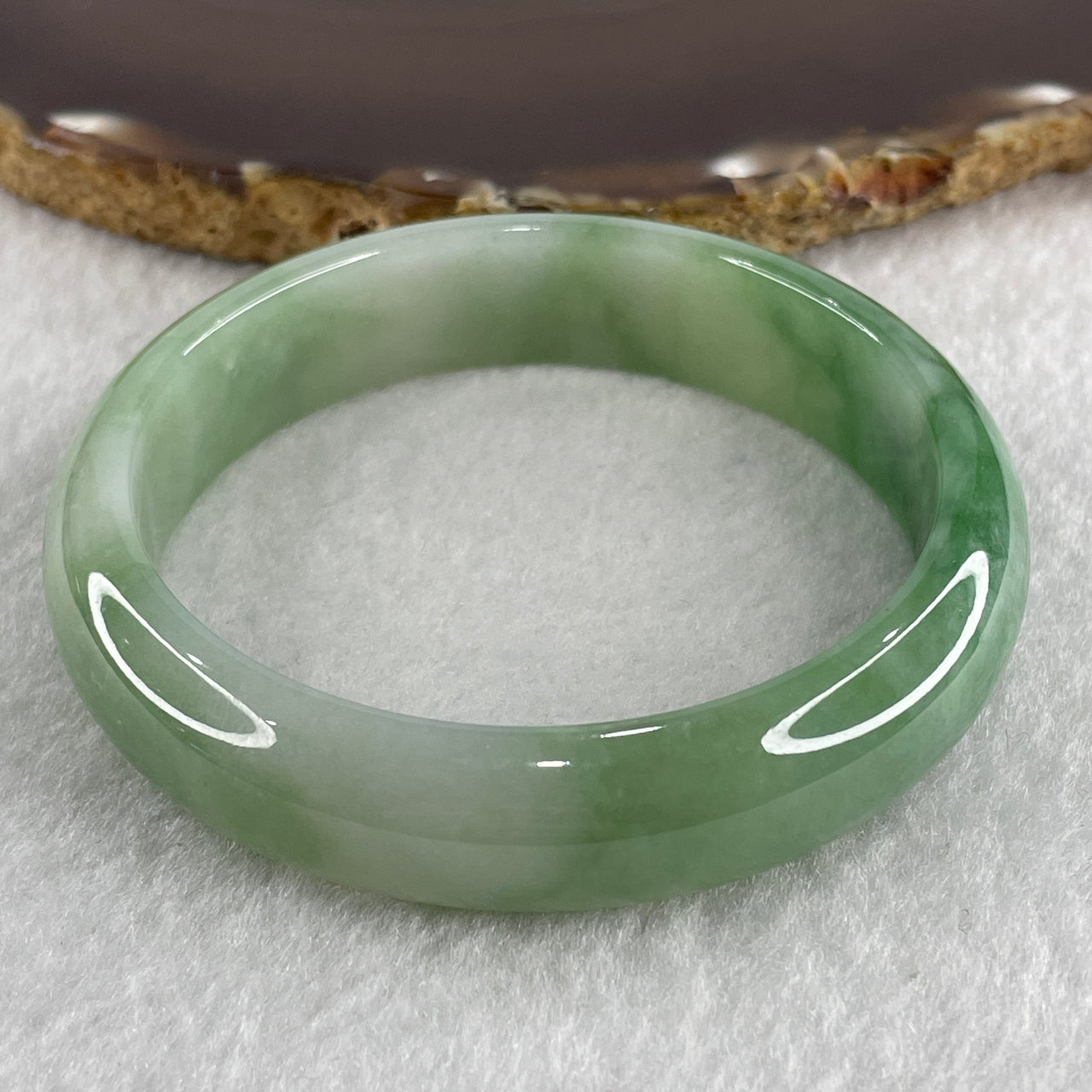Certified Natural Type A Light Green with Green Piao Hua Jadeite Bangle 57.31g Internal Diameter 58.4mm 14.3 by 8.8mm (Very Very Slight External Rough)