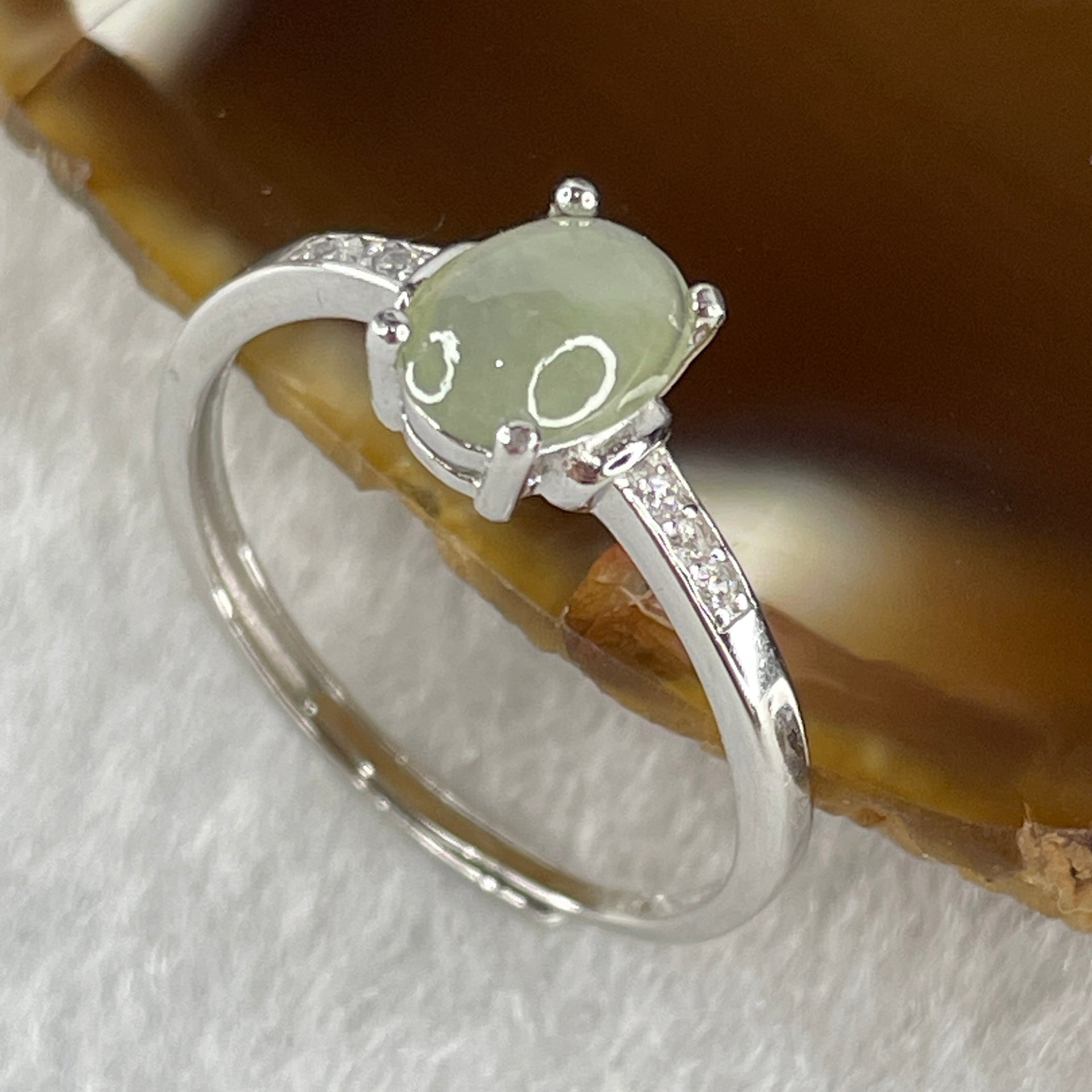 Natural Type A Semi Icy Faint Green Jadeite Oval Shape Cabouchon in S925 Silver Ring (Adjustable Size) 1.22g 7.2 by 5.0 by 2.0mm - Huangs Jadeite and Jewelry Pte Ltd