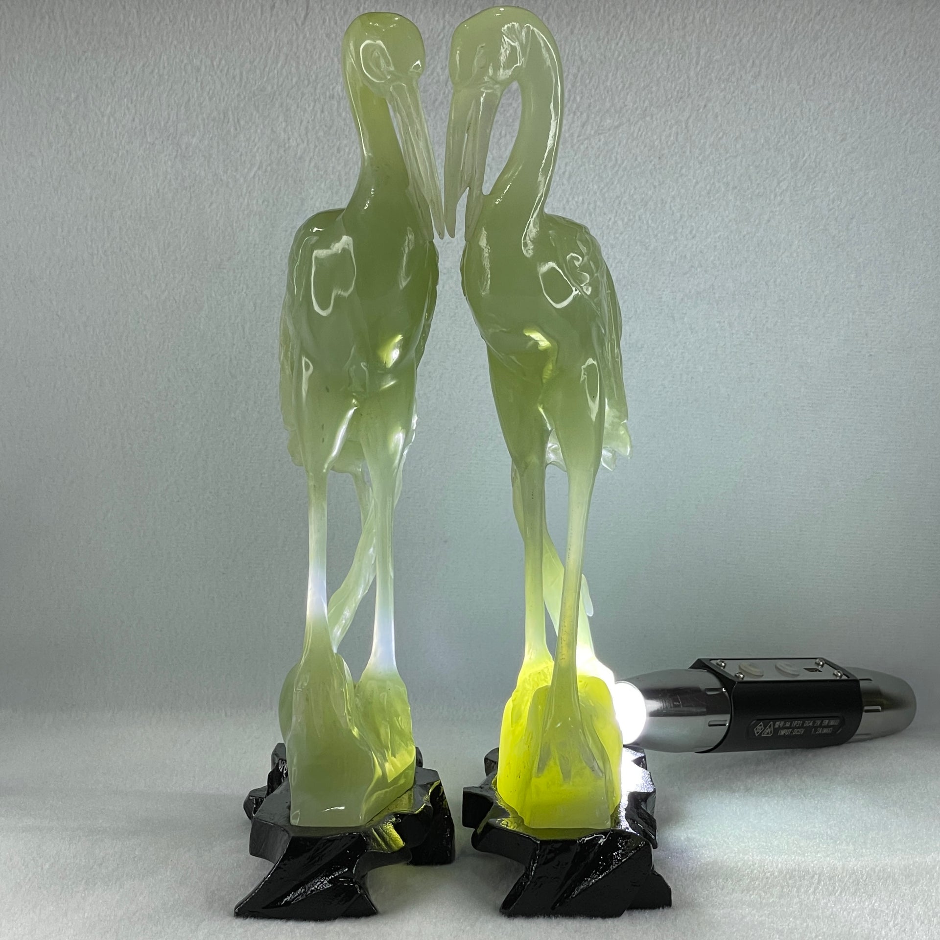 Natural Light Green Serpentine Pair of Cranes Bird with Wooden Stand Display 1,231.1g Each about 135.0 by 60.0 by 240.0mm - Huangs Jadeite and Jewelry Pte Ltd