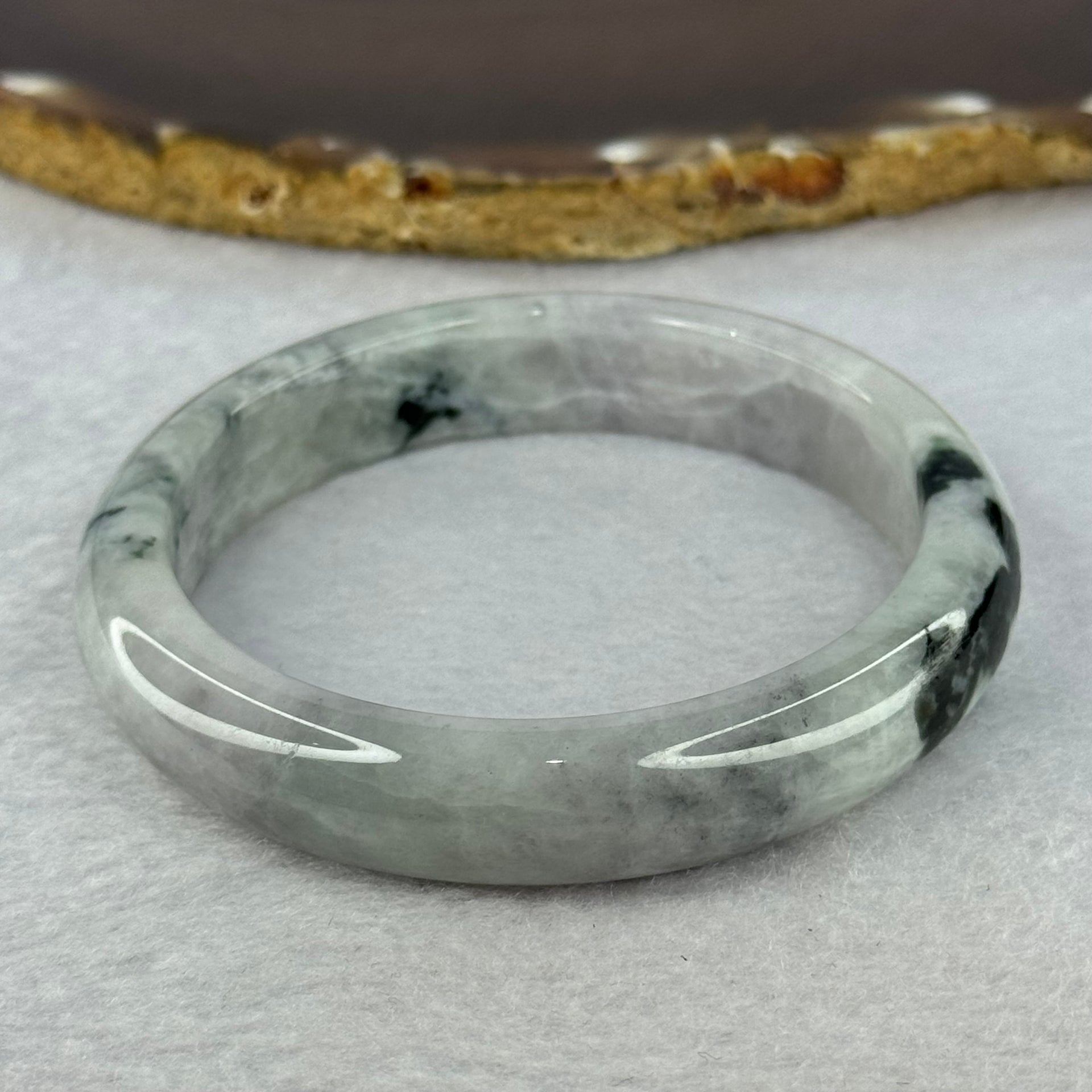 Type A Green Lavender with Dark Green Patches 50.67g Internal Diameter 57.5mm 12.6 by 8.2mm (Internal Lines) - Huangs Jadeite and Jewelry Pte Ltd