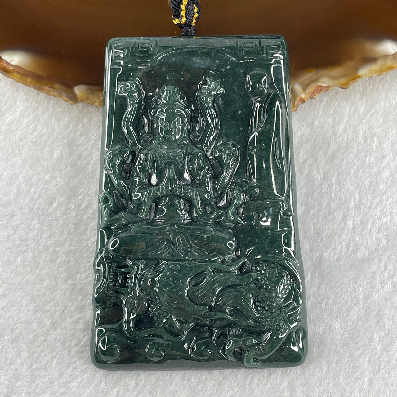 Natural Type A Opaque Dark Blueish Green Jadeite Thousand Hand Guan Yin with Dragon and Disciple Pendant 71.25g 75.0 by 48.4 by 7.8mm