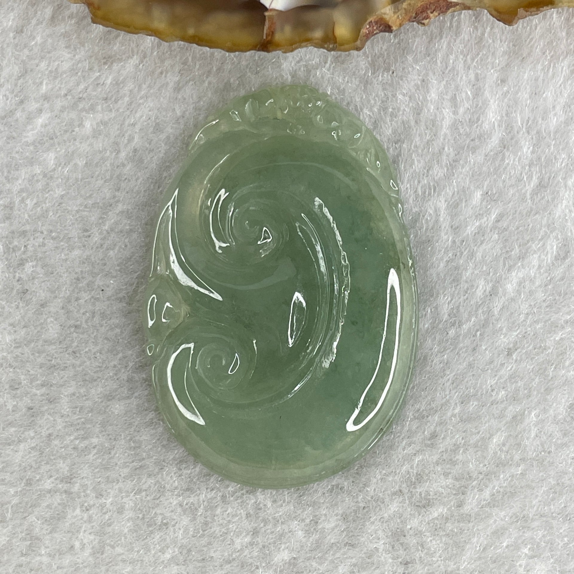 Natural Type A Semi Icy Green Jadeite Monkey on Ruyi Pendant 6.96g 37.6 by 25.5 by 4.4mm - Huangs Jadeite and Jewelry Pte Ltd