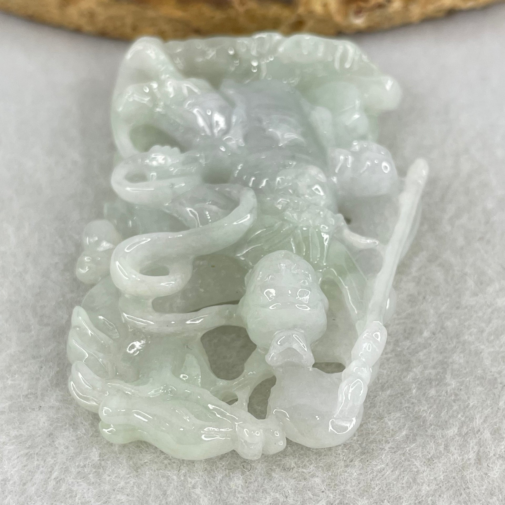 Type A Light Green with Lavender Jadeite Sun Wu Kong with Dragon Pendant 26.42g 52.8 by 36.3 by 36.2mm - Huangs Jadeite and Jewelry Pte Ltd
