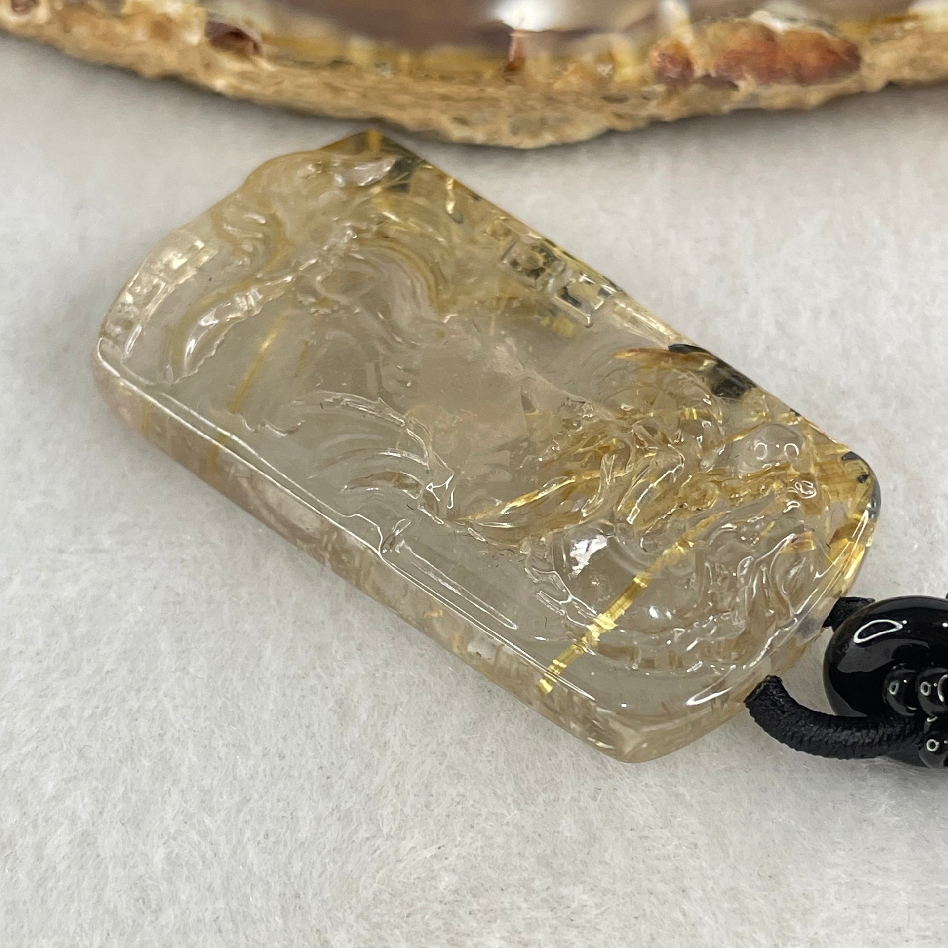 Good Grade Natural Golden Rutilated Quartz Guan Gong and Dragon Pendant with Onyx and Golden Rutilated Quartz Beads Necklace 18.61g 64cm 43.6 by 24.7 by 9.6mm - Huangs Jadeite and Jewelry Pte Ltd