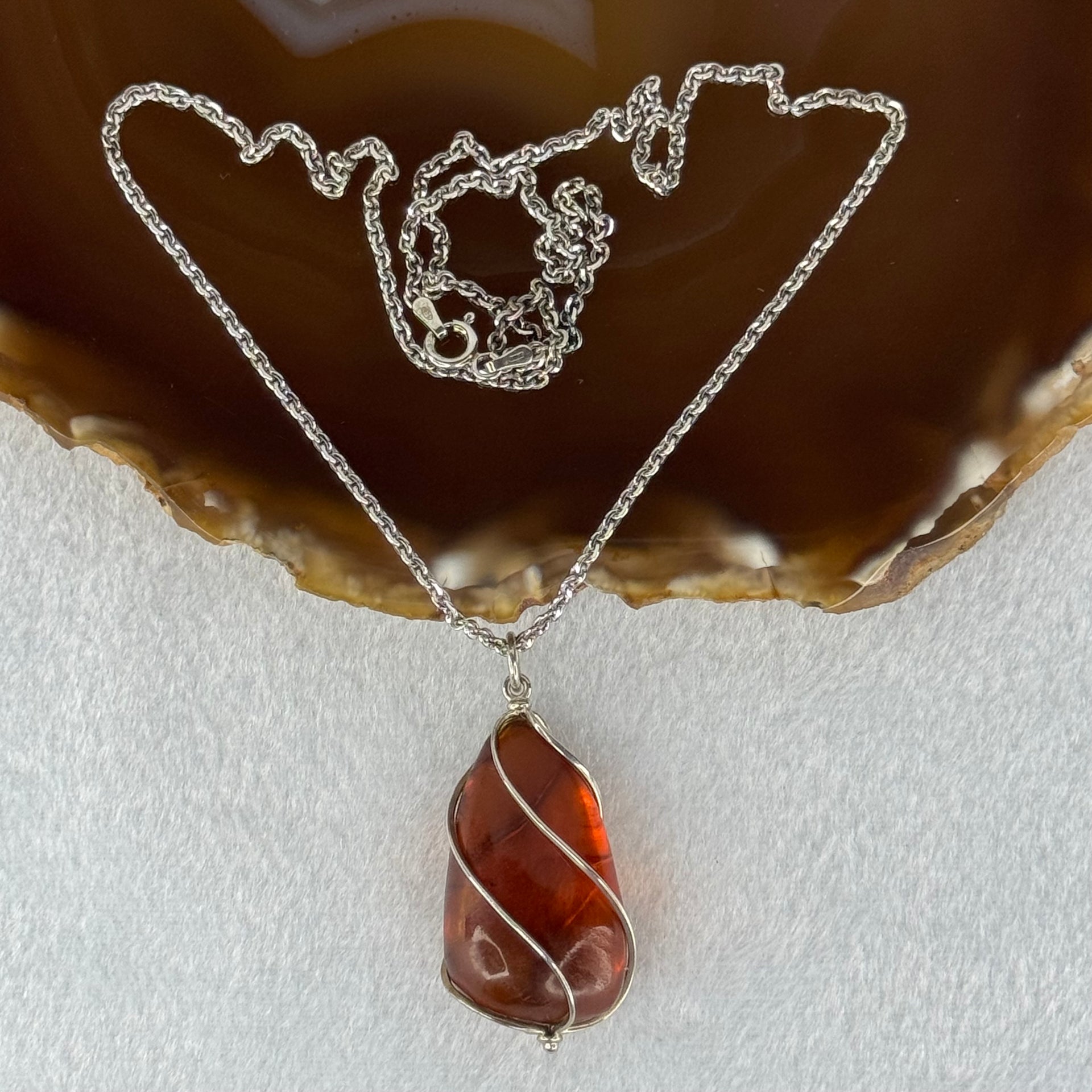 Natural Amber in S925 Sliver Necklace 11.95g 33.5 by 19.4 by 14.5mm - Huangs Jadeite and Jewelry Pte Ltd