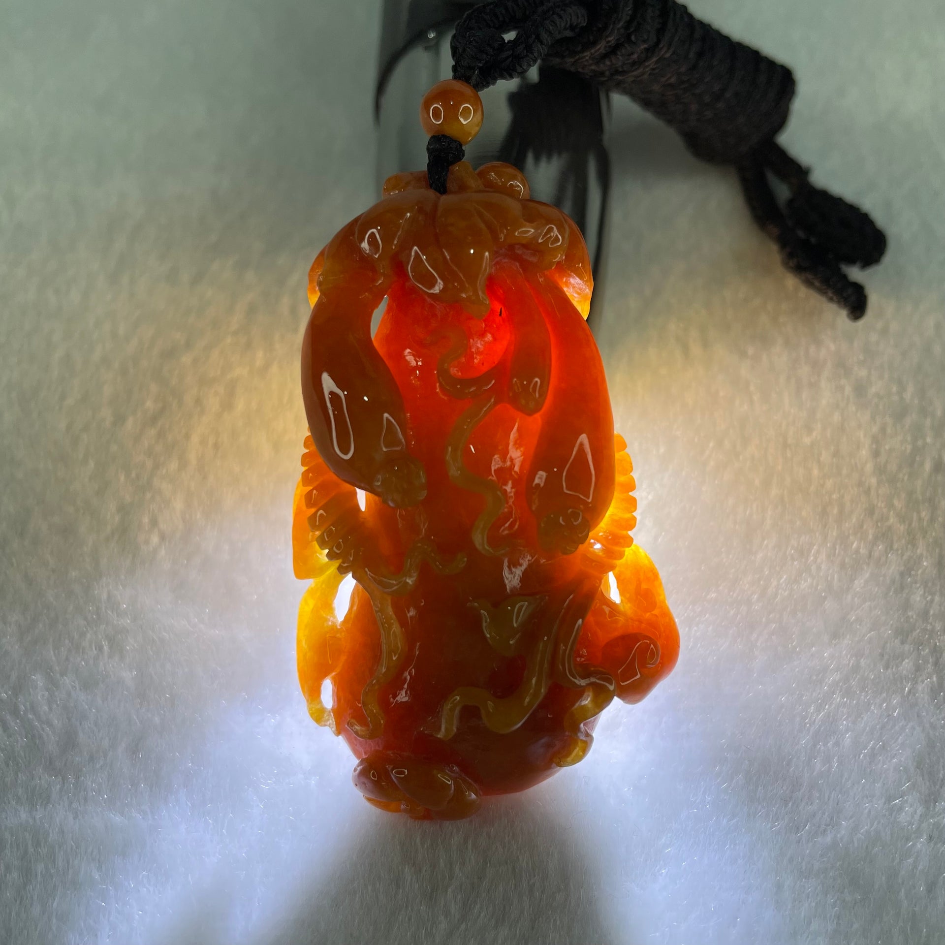Grandmaster Type A Brownish Orange to Brownish Red Jadeite Melon and Ruyi 福瓜 Pendant 45.95g 58.05 by 34.38 by 15.00mm With NGI Cert 82838787 - Huangs Jadeite and Jewelry Pte Ltd