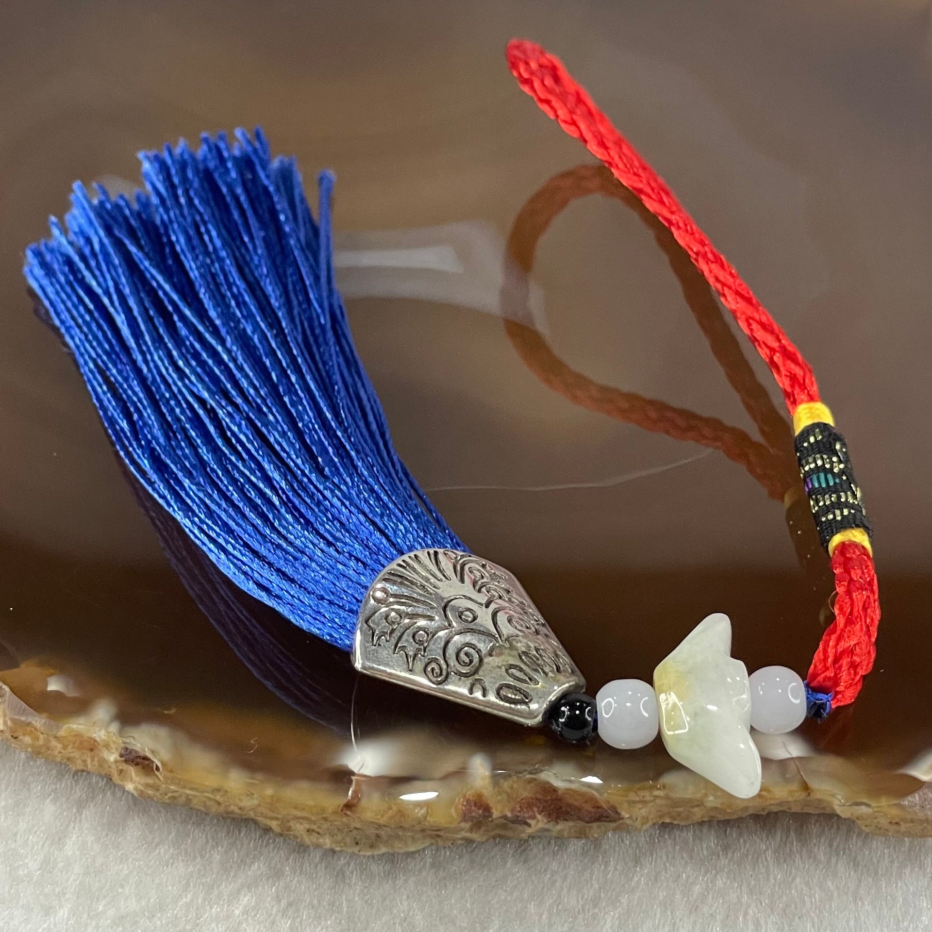 Type A Light Lavender Yellow Jadeite Yuan Bao Ingot in Red Blue String Display 4.75g 7.1 by 17.3 by 6.7mm - Huangs Jadeite and Jewelry Pte Ltd