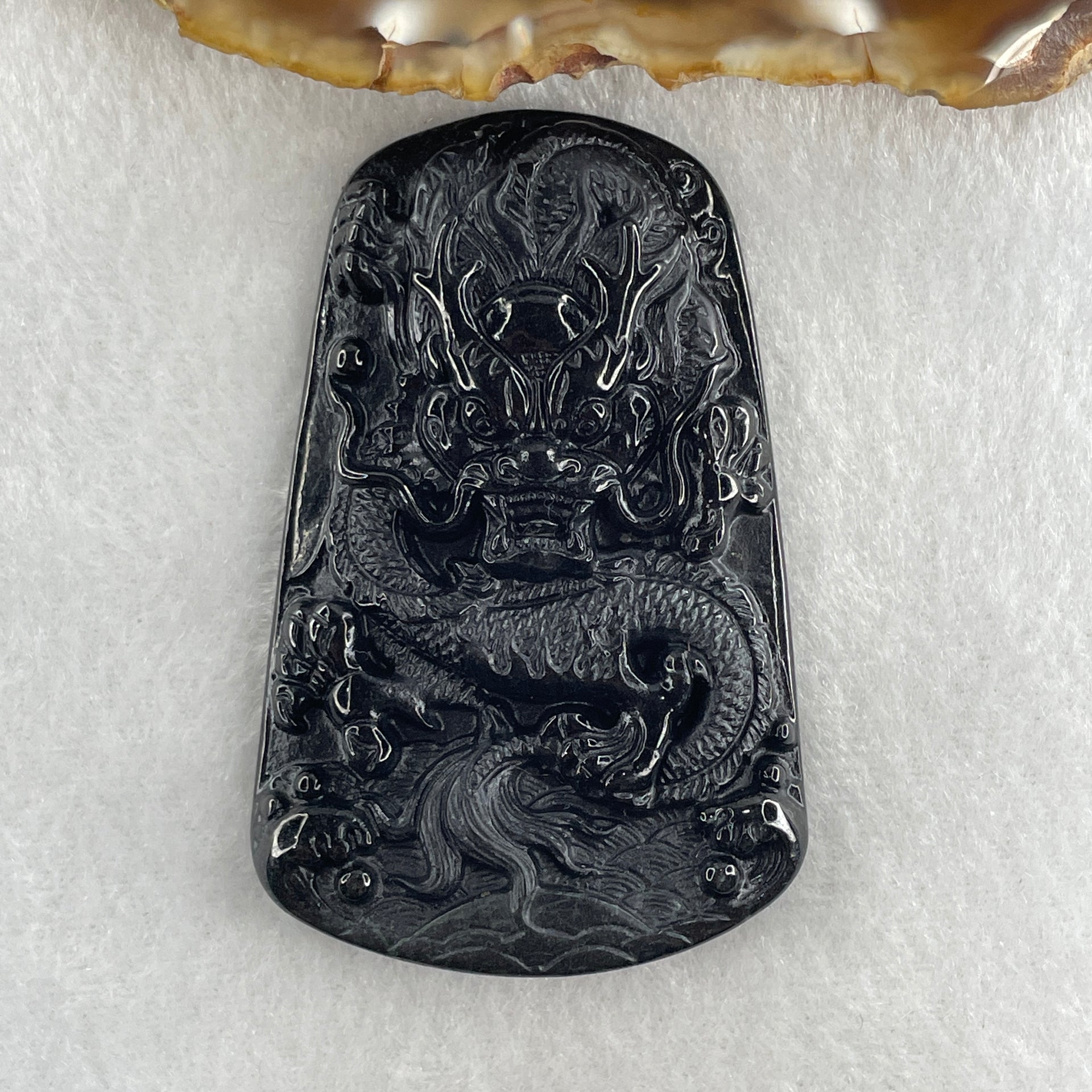 Type A Opaque to Partial Translucent Black Omphacite Jadeite Dragon Pendant 32.91g 66.0 by 42.2 by 9.5mm - Huangs Jadeite and Jewelry Pte Ltd