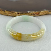 Type A Faint Lavender Green with Yellow Patches Jadeite Oval Bangle Internal Diameter 56.5mm  37.8696g 11.1 by 7.3mm (Very Slight Internal Line) - Huangs Jadeite and Jewelry Pte Ltd
