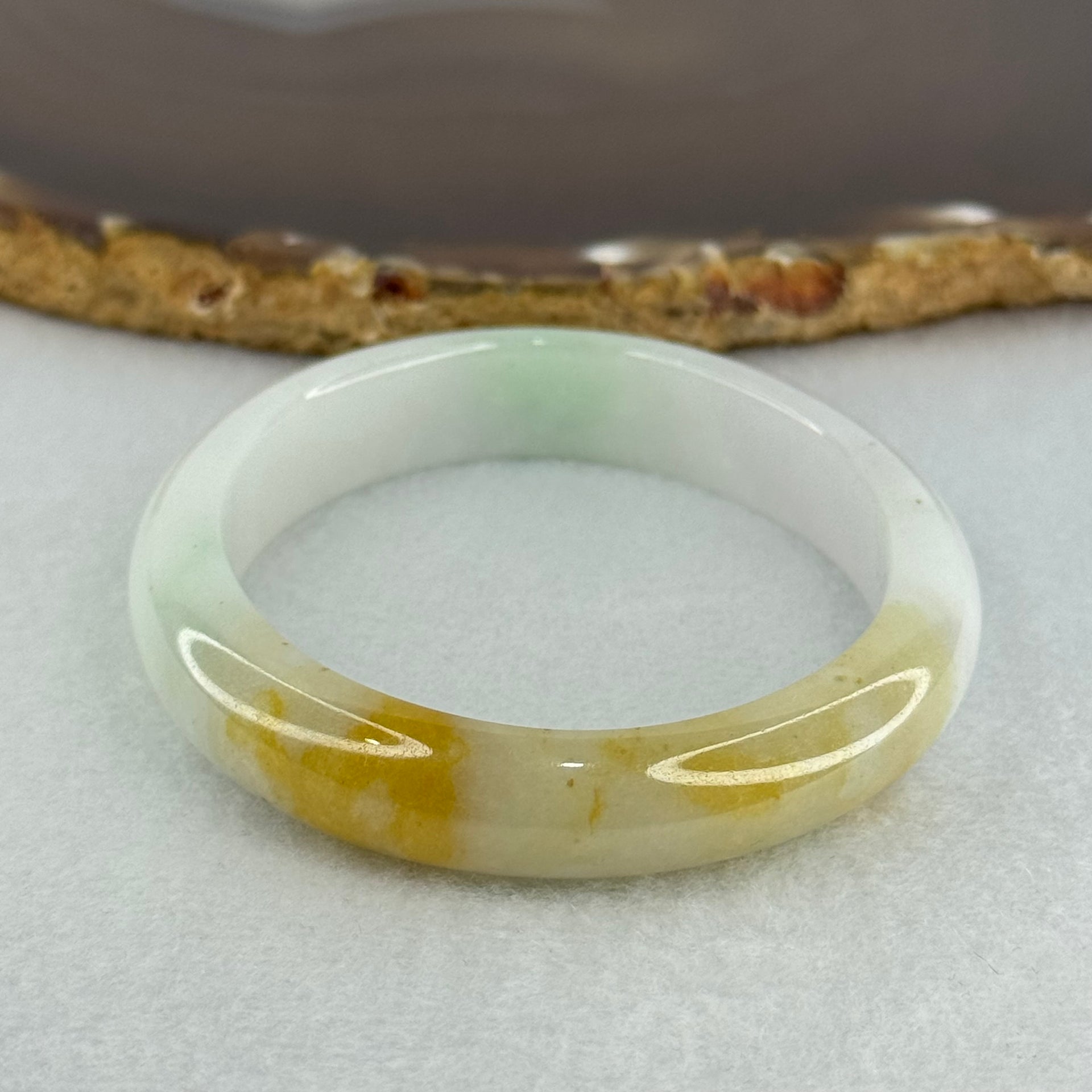 Type A Faint Lavender Green with Yellow Patches Jadeite Oval Bangle Internal Diameter 56.5mm  37.8696g 11.1 by 7.3mm (Very Slight Internal Line) - Huangs Jadeite and Jewelry Pte Ltd