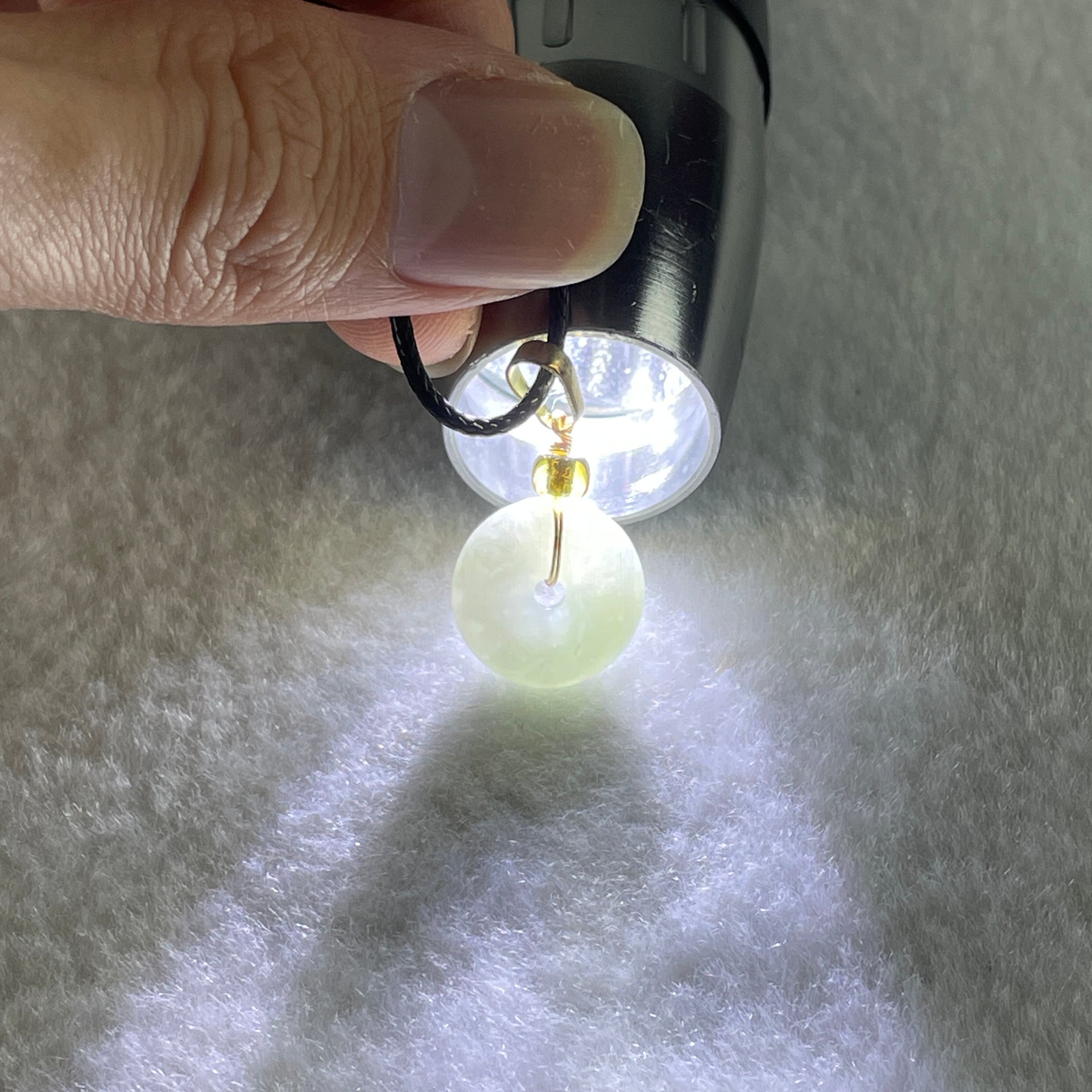 Type A Natural Faint Green Jadeite Ping An Kou Donut In String Necklace 2.68g 13.3 by 4.6mm - Huangs Jadeite and Jewelry Pte Ltd