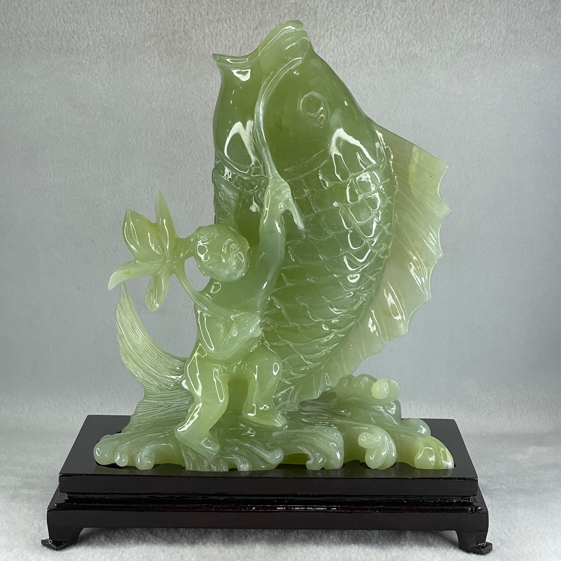 Natural Green Serpentine Carp Fish with Gui ren and Lotus with Wooden Stand Display 2277.9g 215.0 by 120.0 by 250.0mm - Huangs Jadeite and Jewelry Pte Ltd