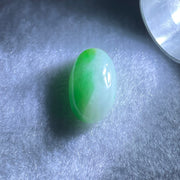Type A Faint to Bright Apple Green Jadeite Oval Cabouchon Stone For Setting 2.34g 19.3 by 10.6 by 6.2mm - Huangs Jadeite and Jewelry Pte Ltd