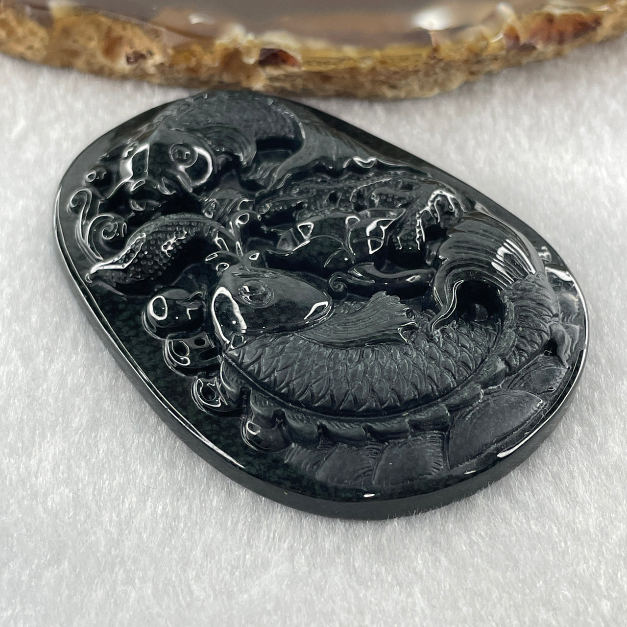 Type A Opaque to Partial Translucent Black Omphacite Jadeite Double Fish with Lotus Flower and Coins Pendant 29.11g 61.1 by 44.1 by 9.2mm - Huangs Jadeite and Jewelry Pte Ltd