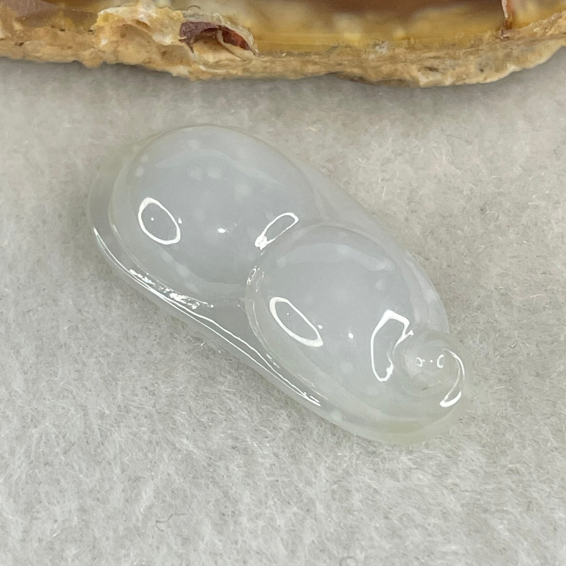 Type A Semi Icy Faint Green with Muna Jadeite Peapod Pendant 4.13g 28.0 by 13.2 by 7.4mm - Huangs Jadeite and Jewelry Pte Ltd