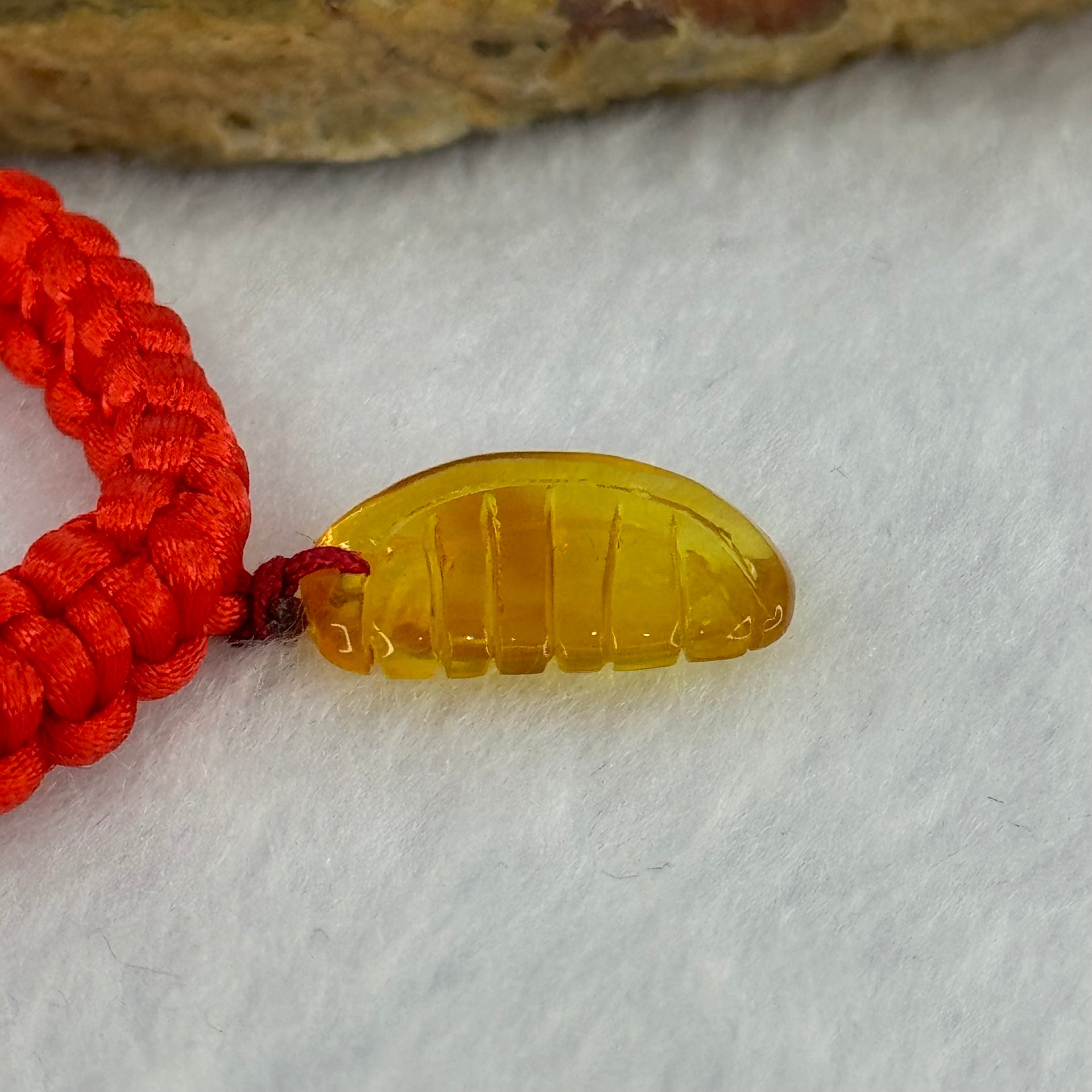 Natural Golden Yellow Amber Comb Charm in Red String Bracelet 2.57g Adjustable Size 17.1 by 11.5 by 3.3mm - Huangs Jadeite and Jewelry Pte Ltd