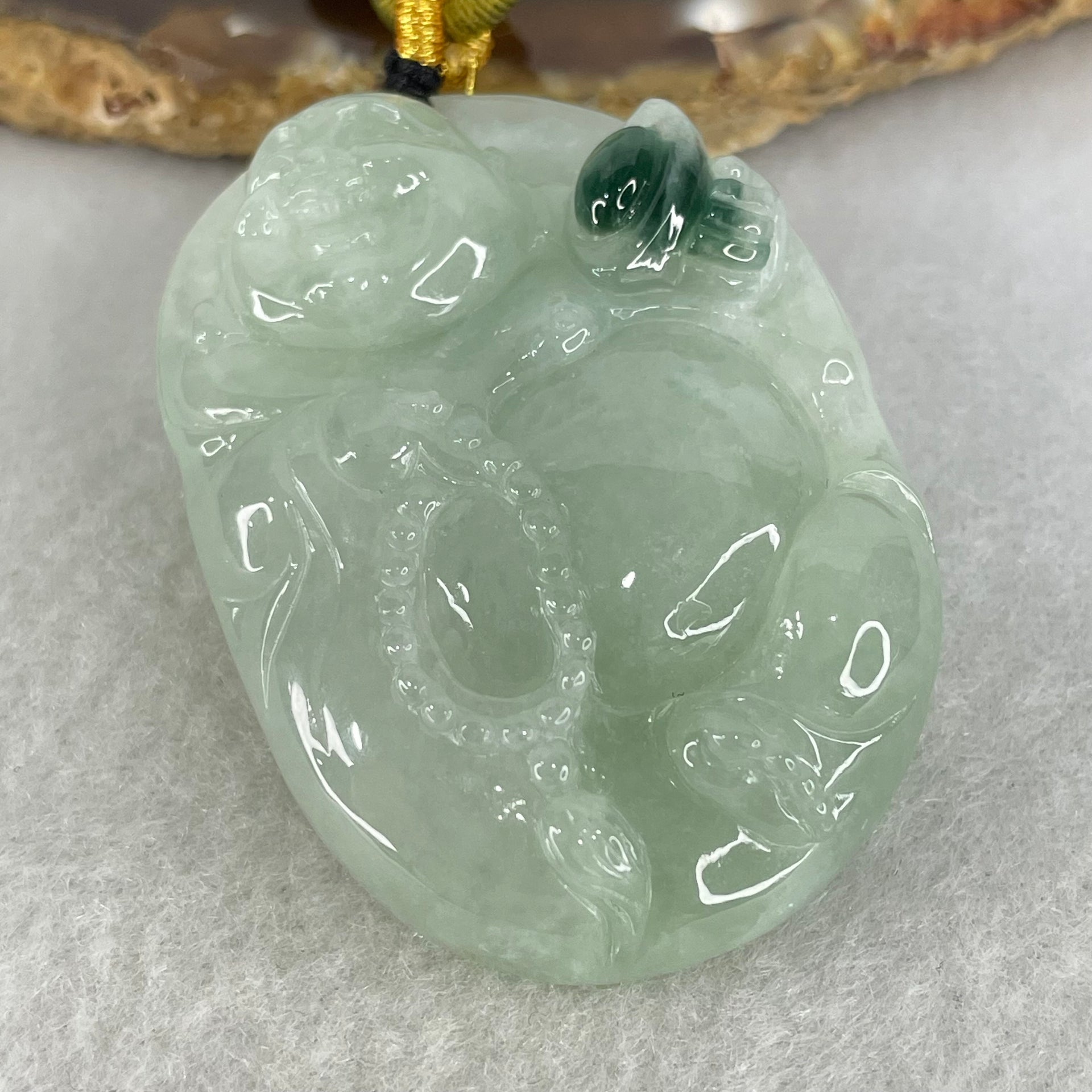 Type A Light Green with Dark Green Spot Jadeite Milo Buddha Pendant 37.98g 48.2 by 34.5 by 12.6mm - Huangs Jadeite and Jewelry Pte Ltd