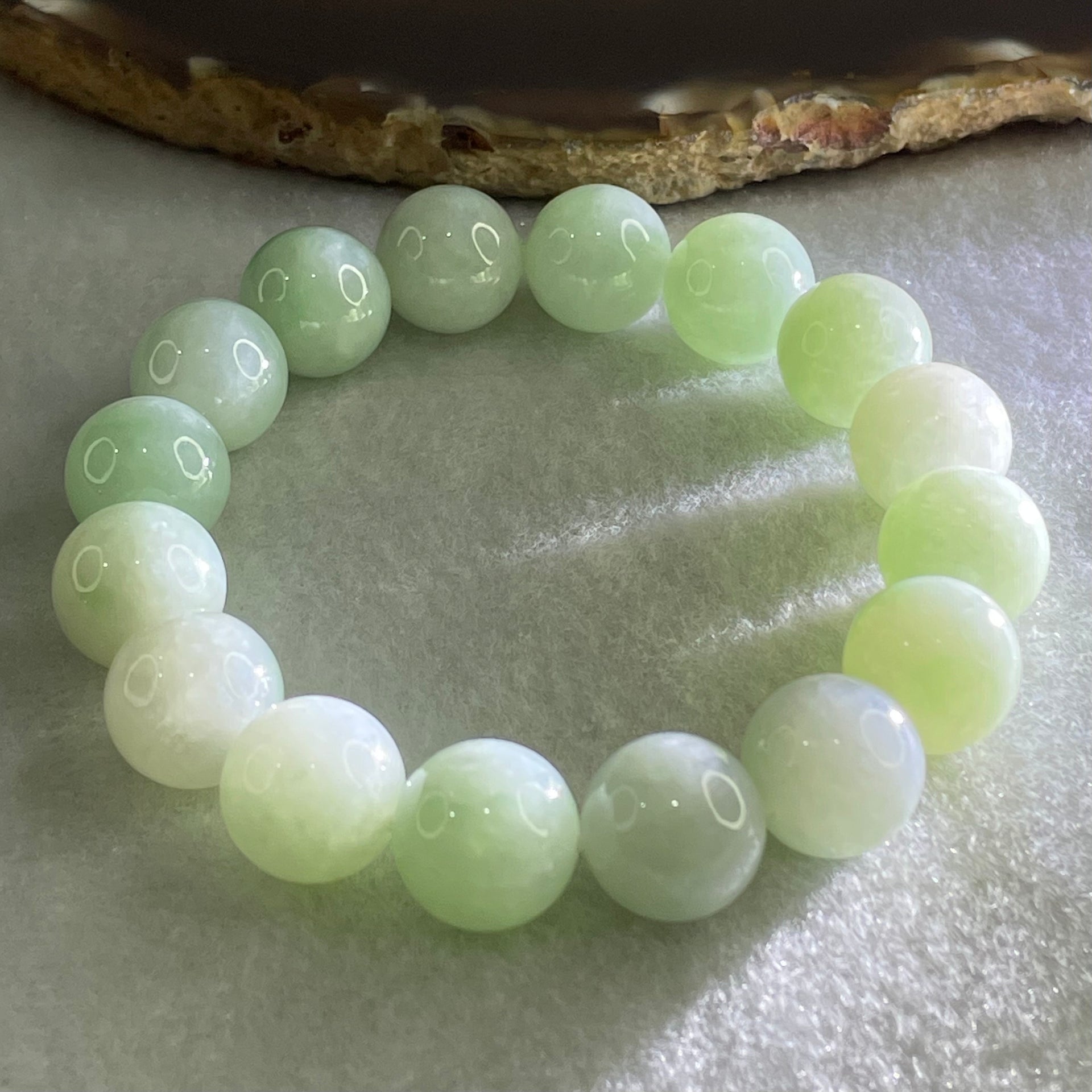 Type A Light Green Jadeite Beads Bracelet 55.28g 16cm 12.6mm 16 Beads - Huangs Jadeite and Jewelry Pte Ltd