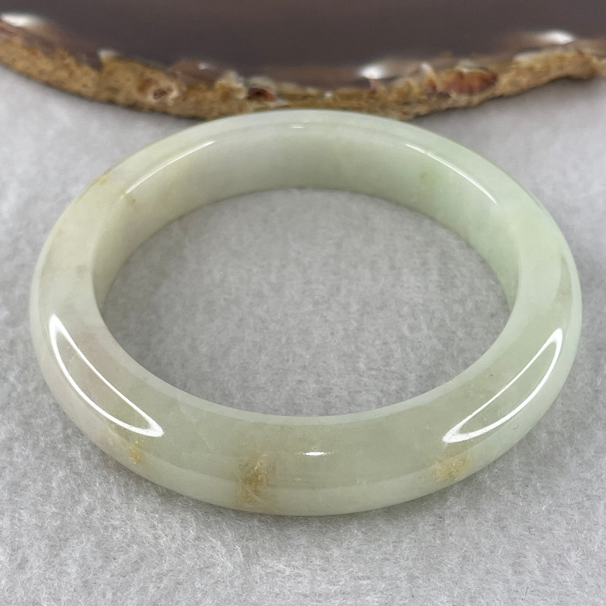 Natural Type Light Green Jadeite Bangle 58.51g Inner Diameter 55.6mm 11.8 by 9.4mm (Internal Line) - Huangs Jadeite and Jewelry Pte Ltd