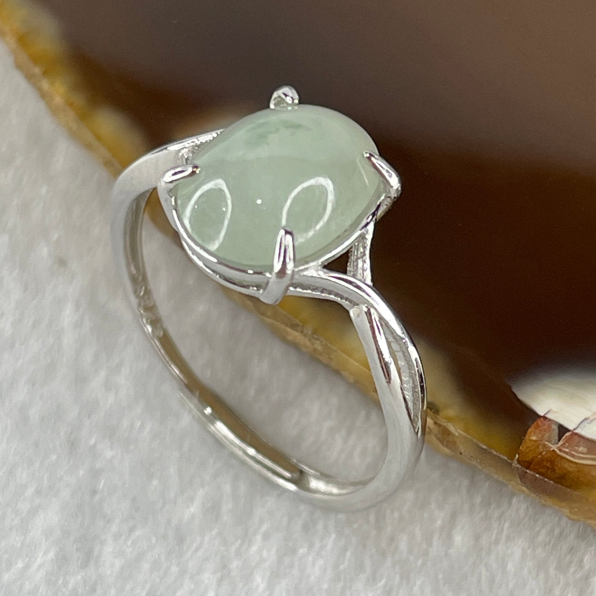 Natural Type A Semi Icy Faint Green Jadeite Oval Shape Cabouchon in S925 Silver Ring (Adjustable Size) 1.38g 9.5 by 7.2 by 3.5mm - Huangs Jadeite and Jewelry Pte Ltd