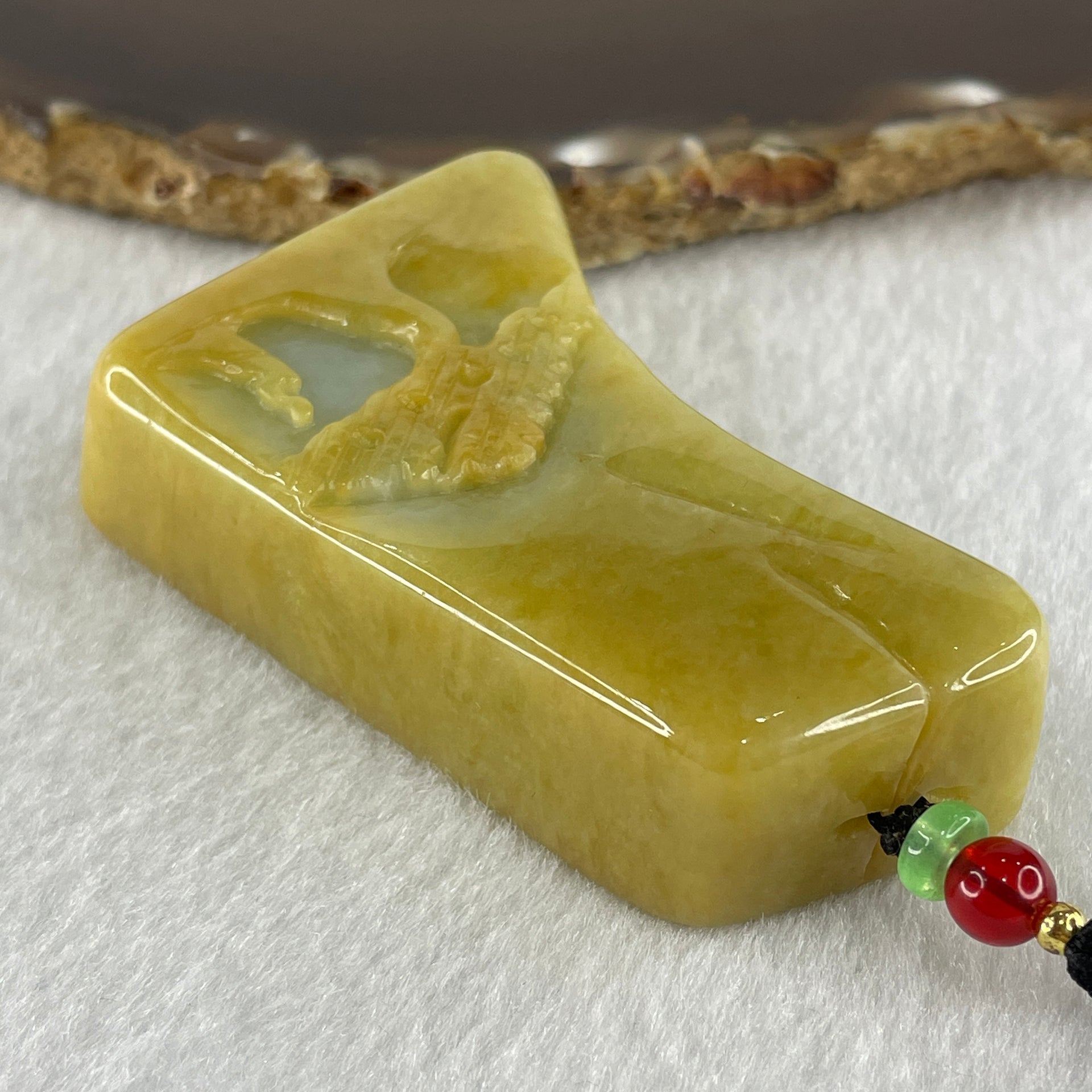Natural Type A Yellow Jadeite Shan Shui Scenic with Gui Ren Benefactor 99.67g 66.1 by 39.8 by 17.2mm (Burned) - Huangs Jadeite and Jewelry Pte Ltd