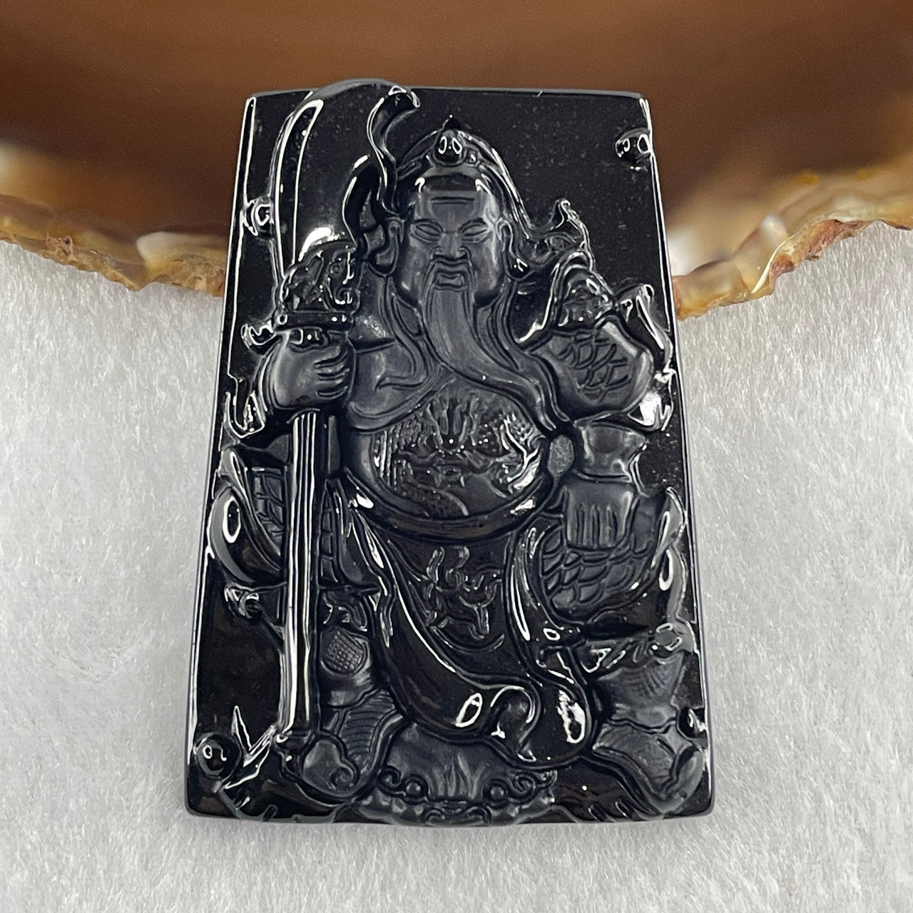 Type A Opaque to Partial Translucent Black Omphacite Jadeite Guan Gong Pendant 29.60g 58.4 by 41.6 by 7.5mm - Huangs Jadeite and Jewelry Pte Ltd