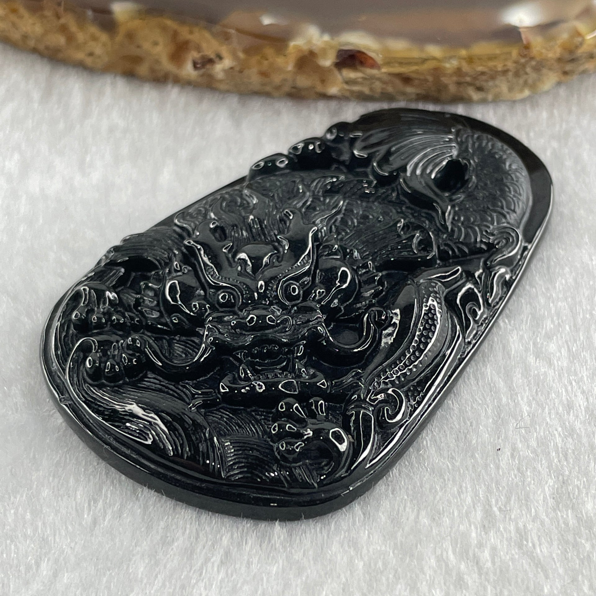 Type A Opaque to Partial Translucent Black Omphacite Jadeite Dragon Carp Pendant 20.39g 57.5 by 36.6 by 7.5mm - Huangs Jadeite and Jewelry Pte Ltd