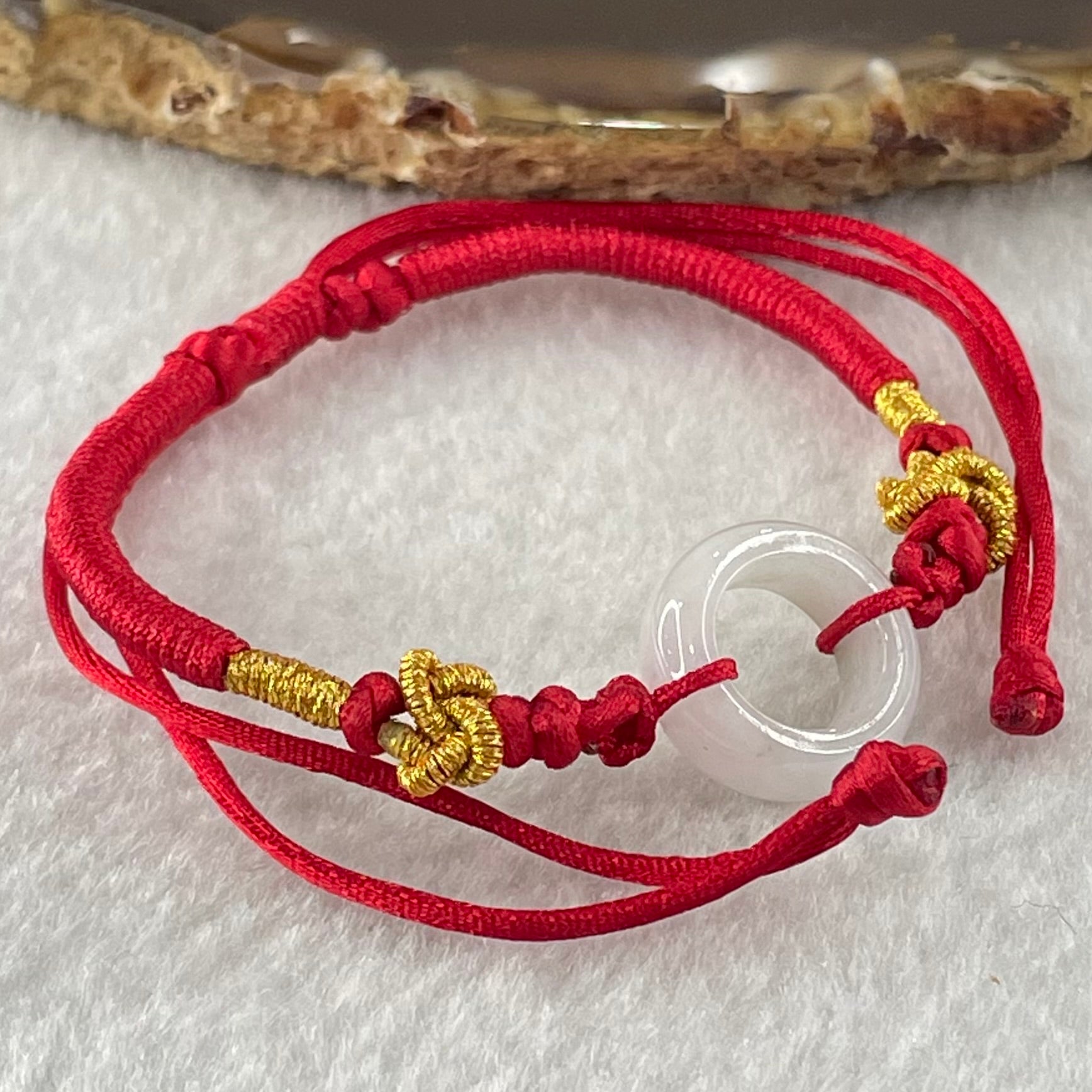 Type A Faint Lavender Jadeite Ping An Kou String Bracelet 2.91g 15.0 by 5.8mm - Huangs Jadeite and Jewelry Pte Ltd