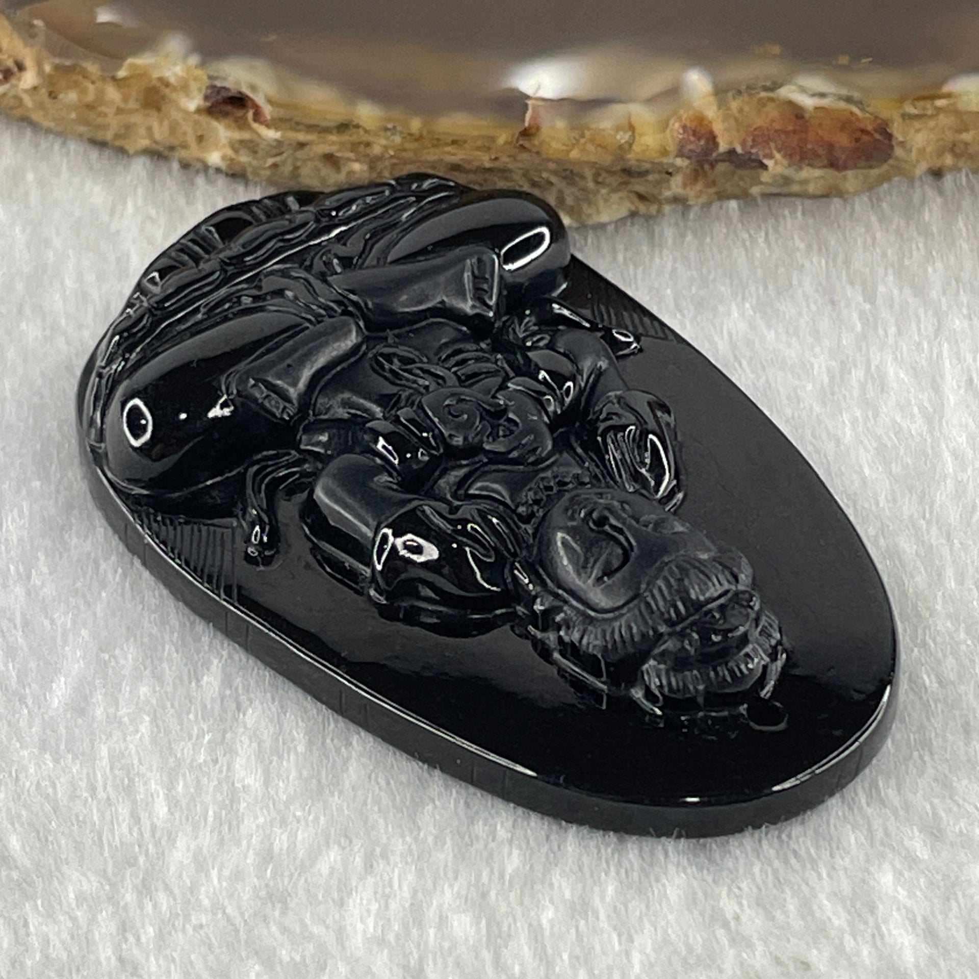 Type A Opaque to Partial Translucent Black Omphacite Jadeite Da ri ru lai 大日如來 Vairocana Buddha Pendant Goat and Monkey Zodiac Guardian 17.20g 53.0 by 32.9 by 9.6mm - Huangs Jadeite and Jewelry Pte Ltd