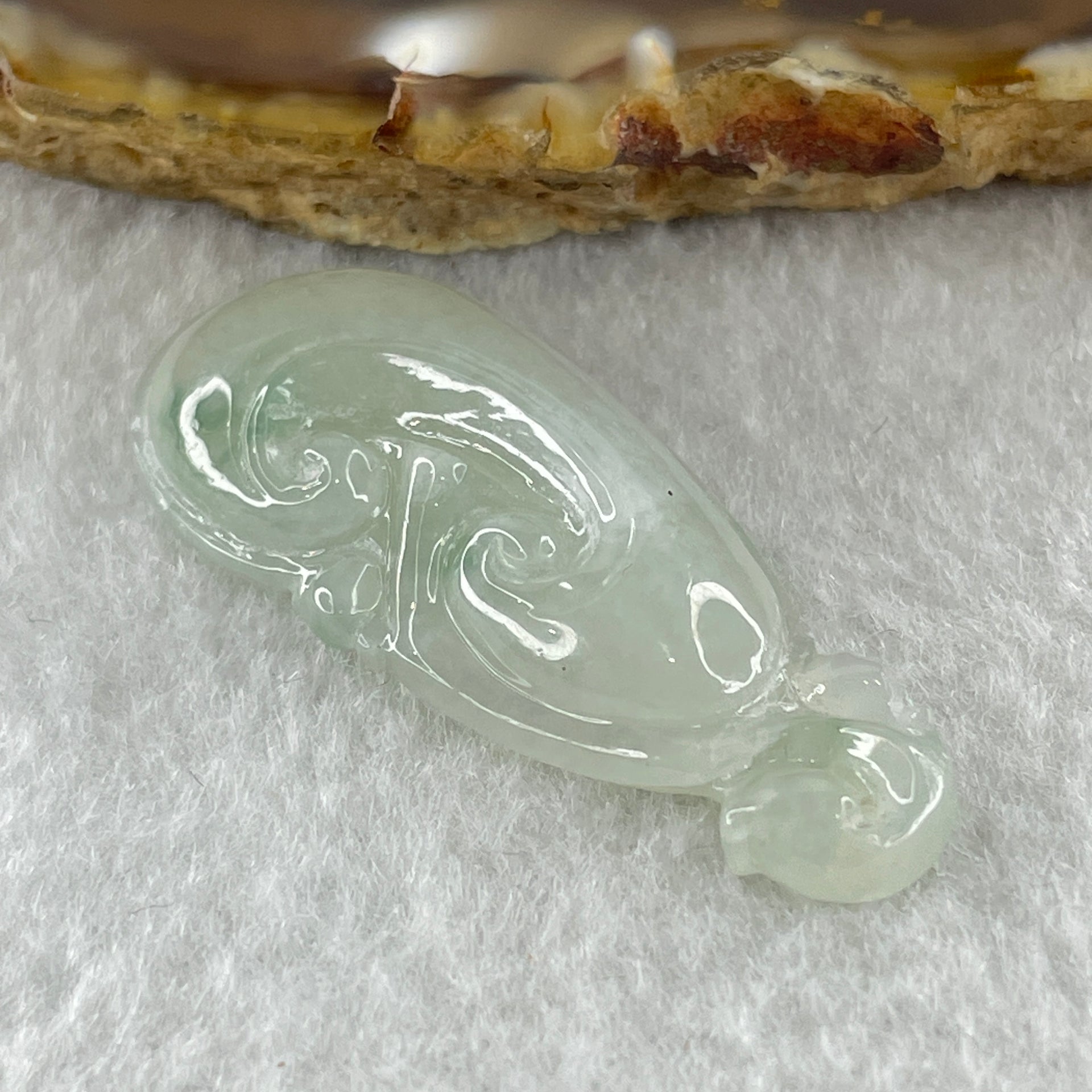 Type A Natural Semi Icy White to Faint Green with Green Patches Jadeite Ruyi Pendant 6.13g 39.5 by 17.3 by 6.7mm - Huangs Jadeite and Jewelry Pte Ltd
