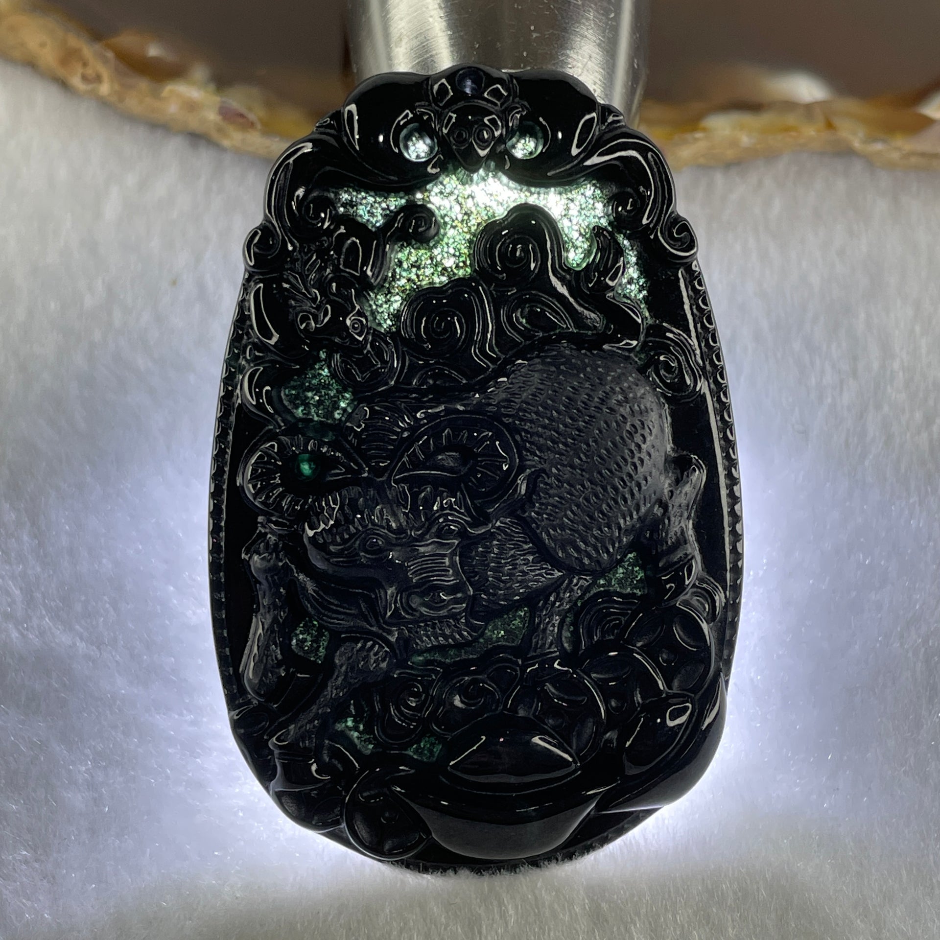 Type A Opaque to Partial Translucent Black Omphacite Jadeite Ox Pendant 20.24g 59.5 by 39.4 by 7.6mm - Huangs Jadeite and Jewelry Pte Ltd