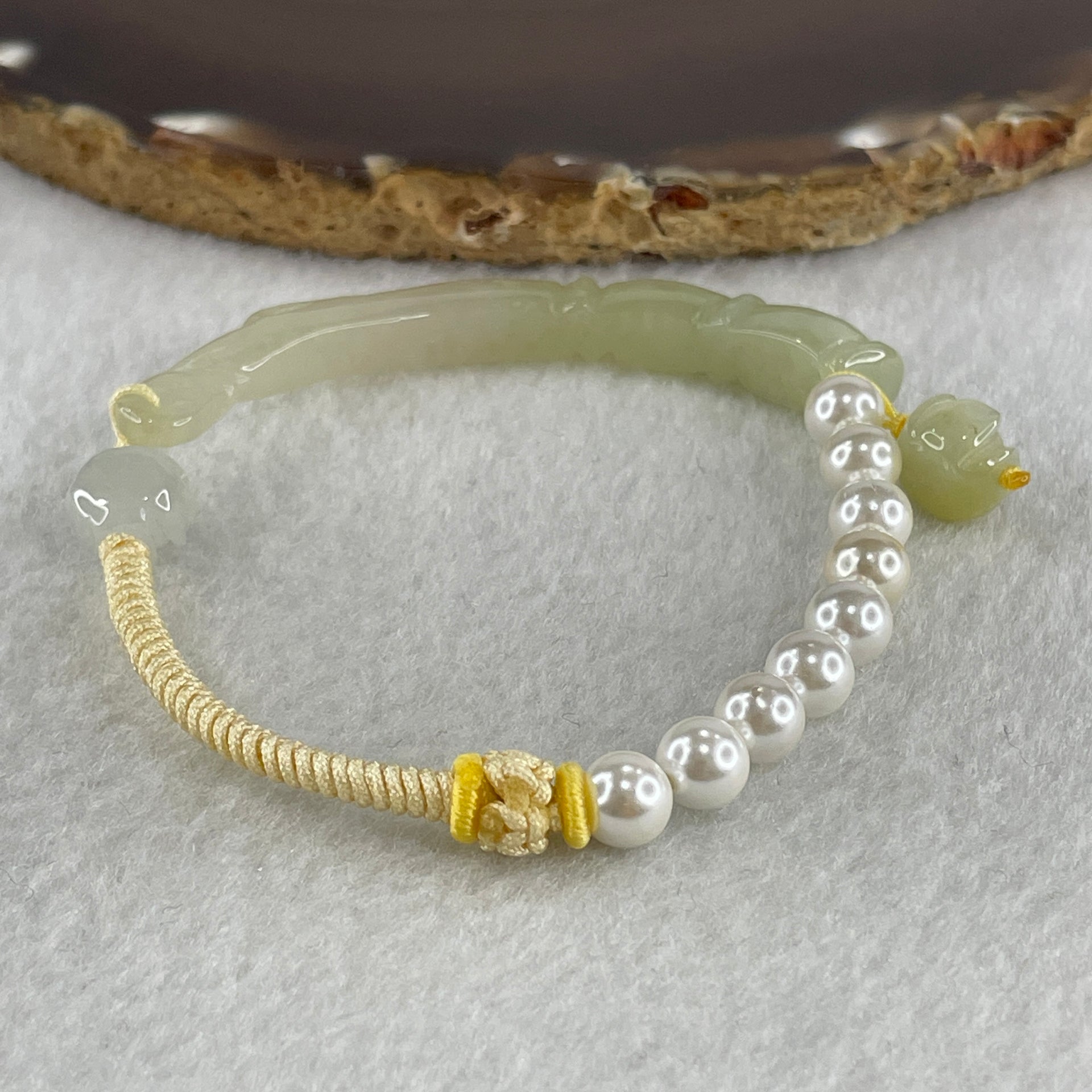 Natural Type A Semi Icy Light Green with Yellowish Jadeite Bamboo with Lotus Charm Bracelet 14.64g 15.5cm 6.18 by 7.5 by 8.2mm - Huangs Jadeite and Jewelry Pte Ltd
